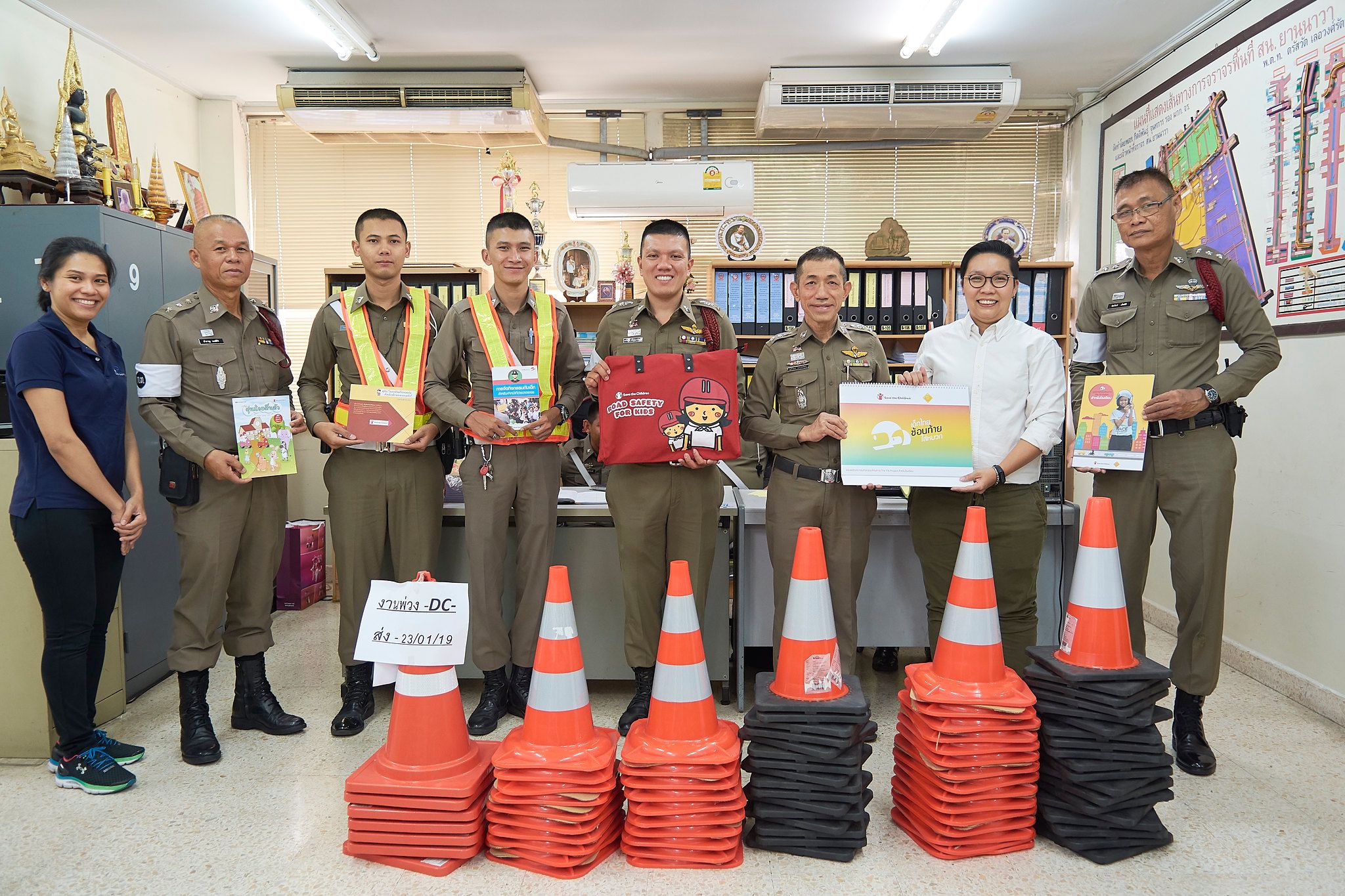 AIP Foundation team with the Yannawa Metropolitan Police and their new safety equipment.