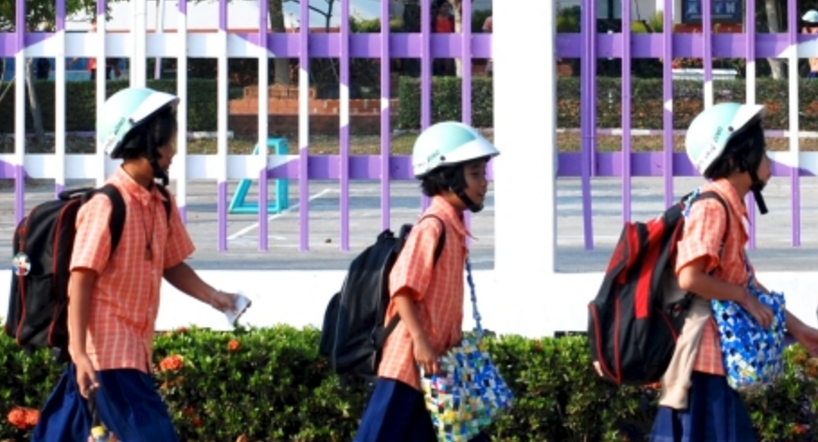 These Thai students never used to wear helmets – now, after a successfully-implemented Helmets for Kids project, nearly 100% of them do.
