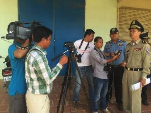 Journalists interact with local traffic police and get their views on the current state of road safety during a media tour around the Phnom Penh region.