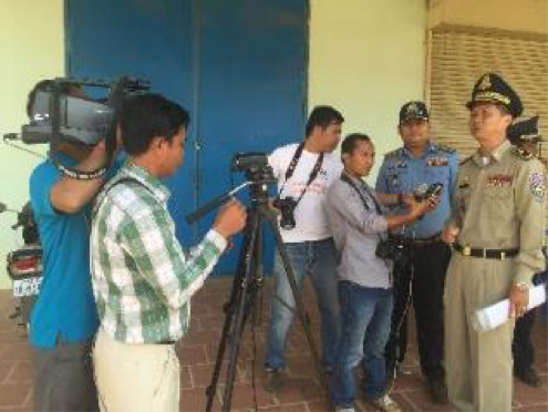 Journalists interact with local traffic police and get their views on the current state of road safety during a media tour around the Phnom Penh region.