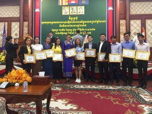 Awardees receiving the certificates from the National Road Safety Committee