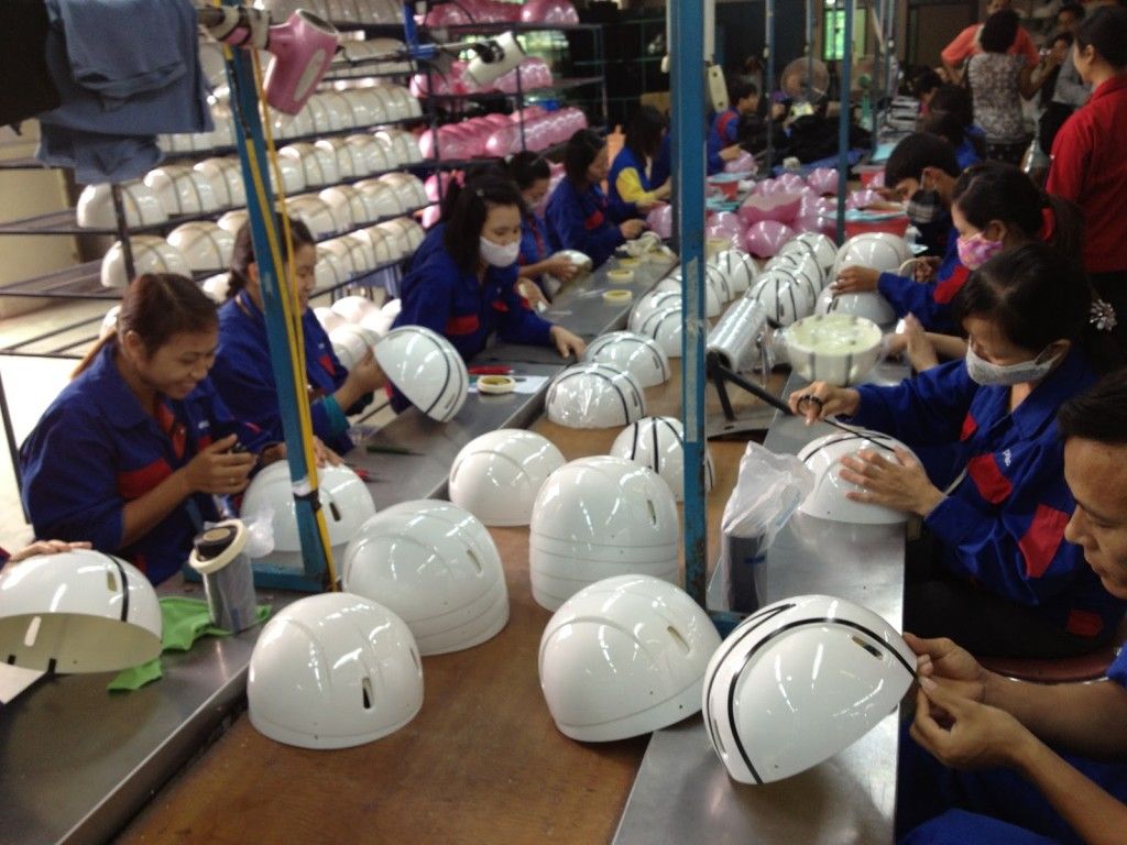 Cambodian officials visit Hanoi helmet labs to deliberate building centers in Cambodia