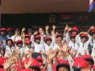 US Centers for Disease Control and Prevention sponsors Helmets for Kids at 2 schools in Kratie province in response to dire helmet wearing rate
