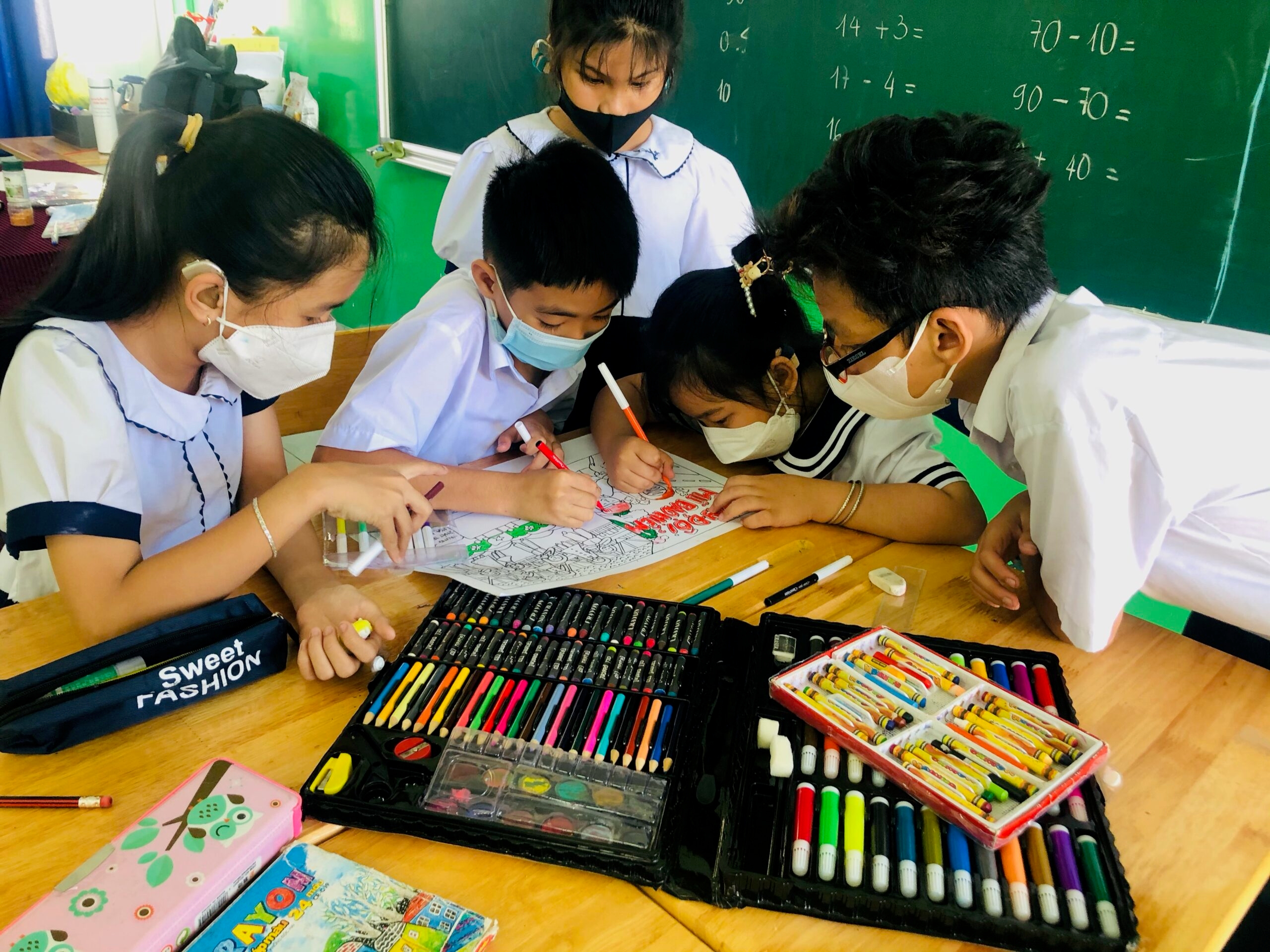 Students use artwork to express the lessons learned through the Safety Delivered program in Vietnam