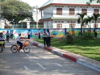 Children practice their road safety skills in newly running Traffic Safety Park