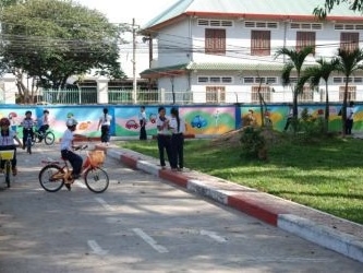 Children practice their road safety skills in newly running Traffic Safety Park