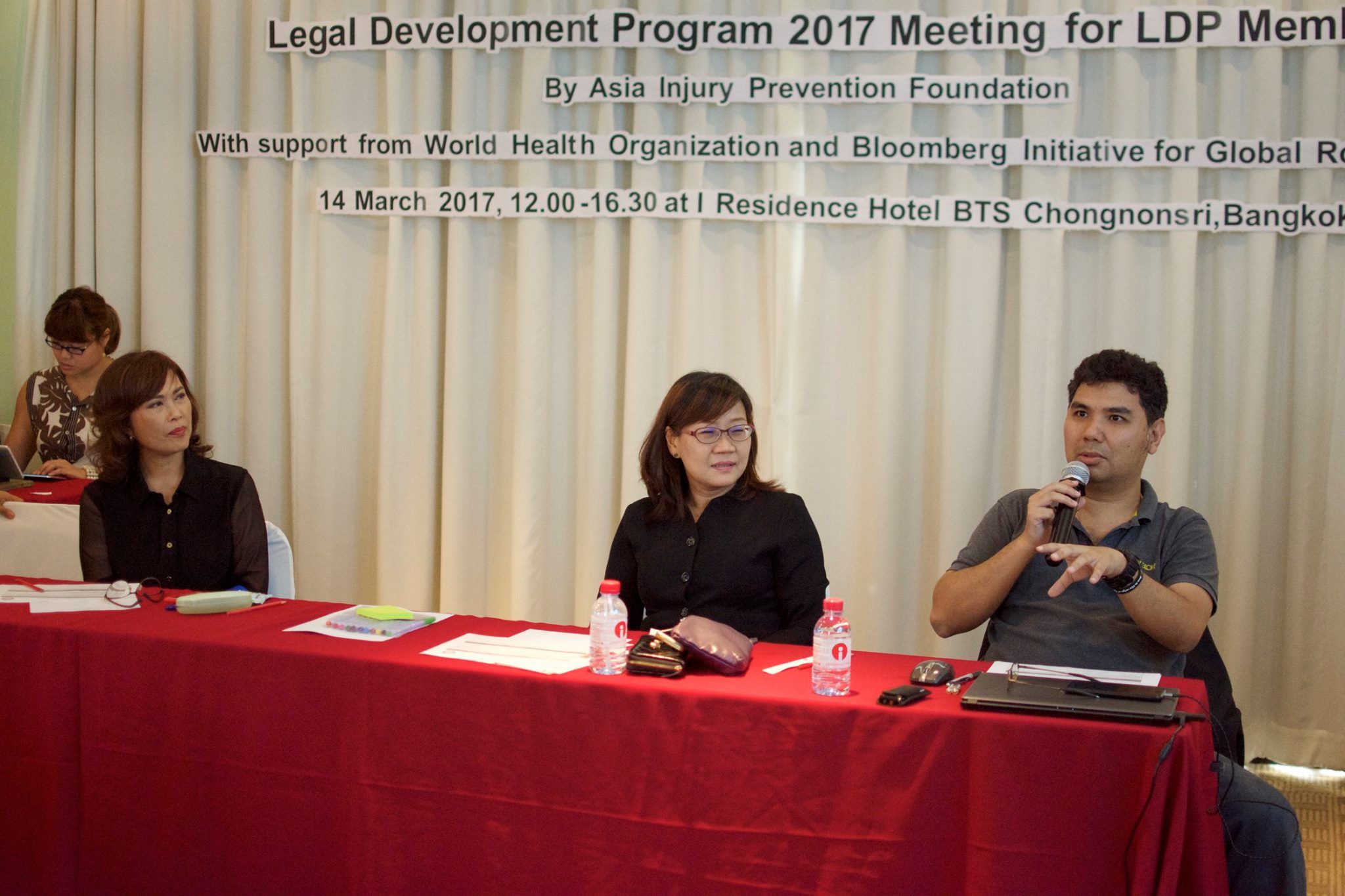 Legal Development Program (LDP) member Thatchawut Jardbandista (right) discusses the initiative during the year three kick-off meeting.