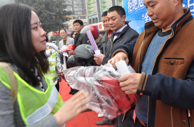 Quality helmets are distributed to attendees to encourage helmet use and to keep motorcyclists safe