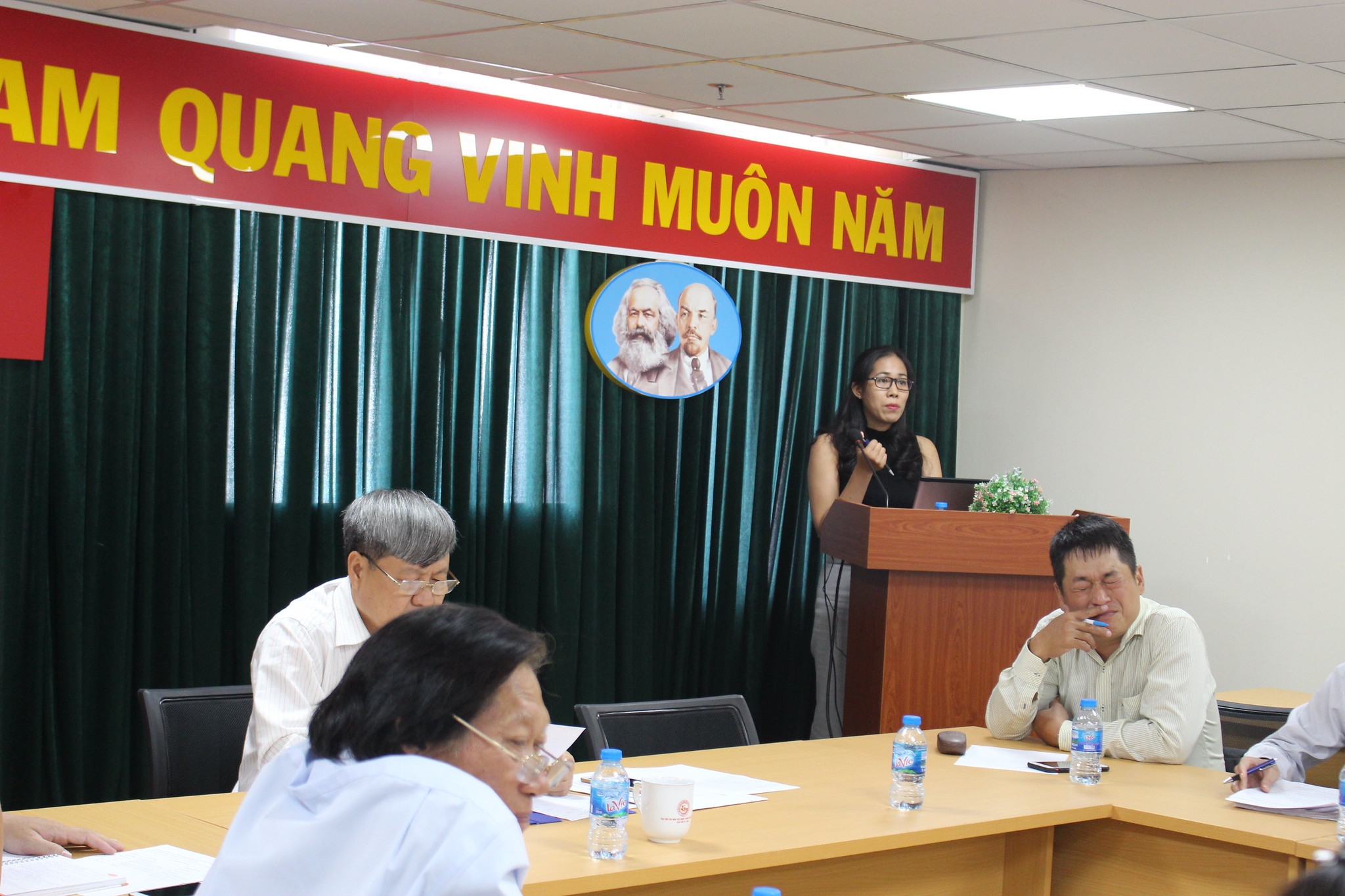 AIP Foundation’s Hong Bui speaking at the review meeting.