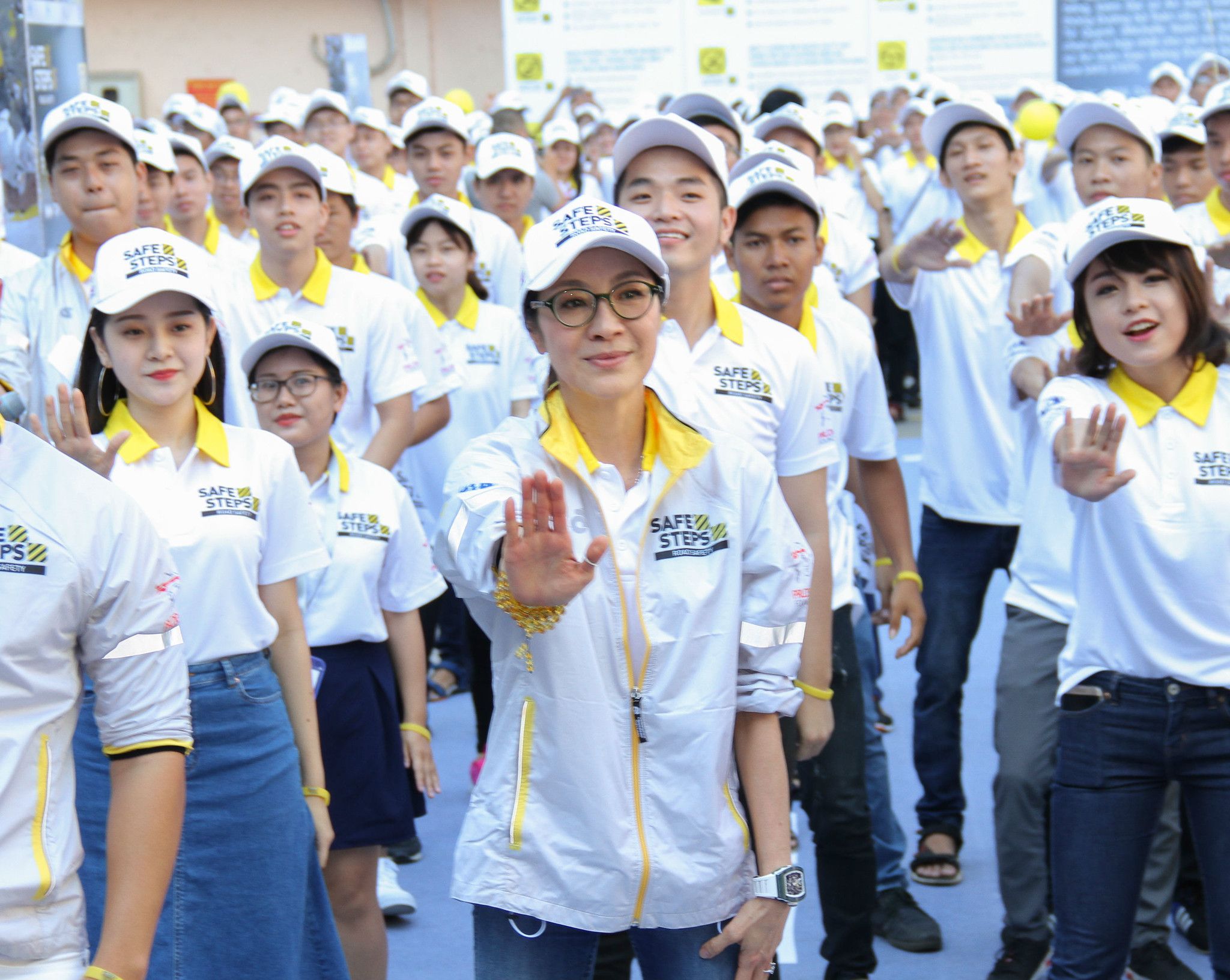 Michelle Yeoh dances with students at the SAFE STEPS Road Safety campaign launch.