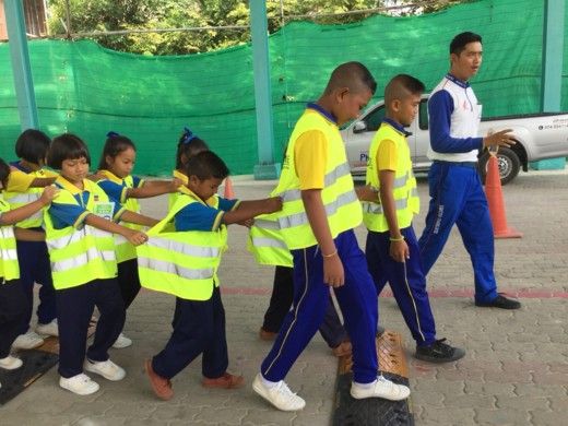 Students participating in road safety games.