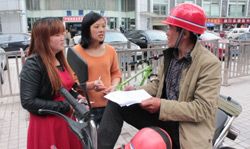 Volunteers gather feedback from motorcycle taxi drivers to inform future AIP Foundation programming.