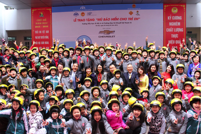 Ai Mo A primary school children wearing helmets offer by General Motors Vietnam