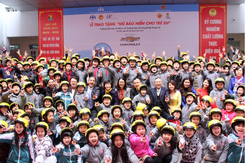Ai Mo A primary school children wearing helmets offer by General Motors Vietnam