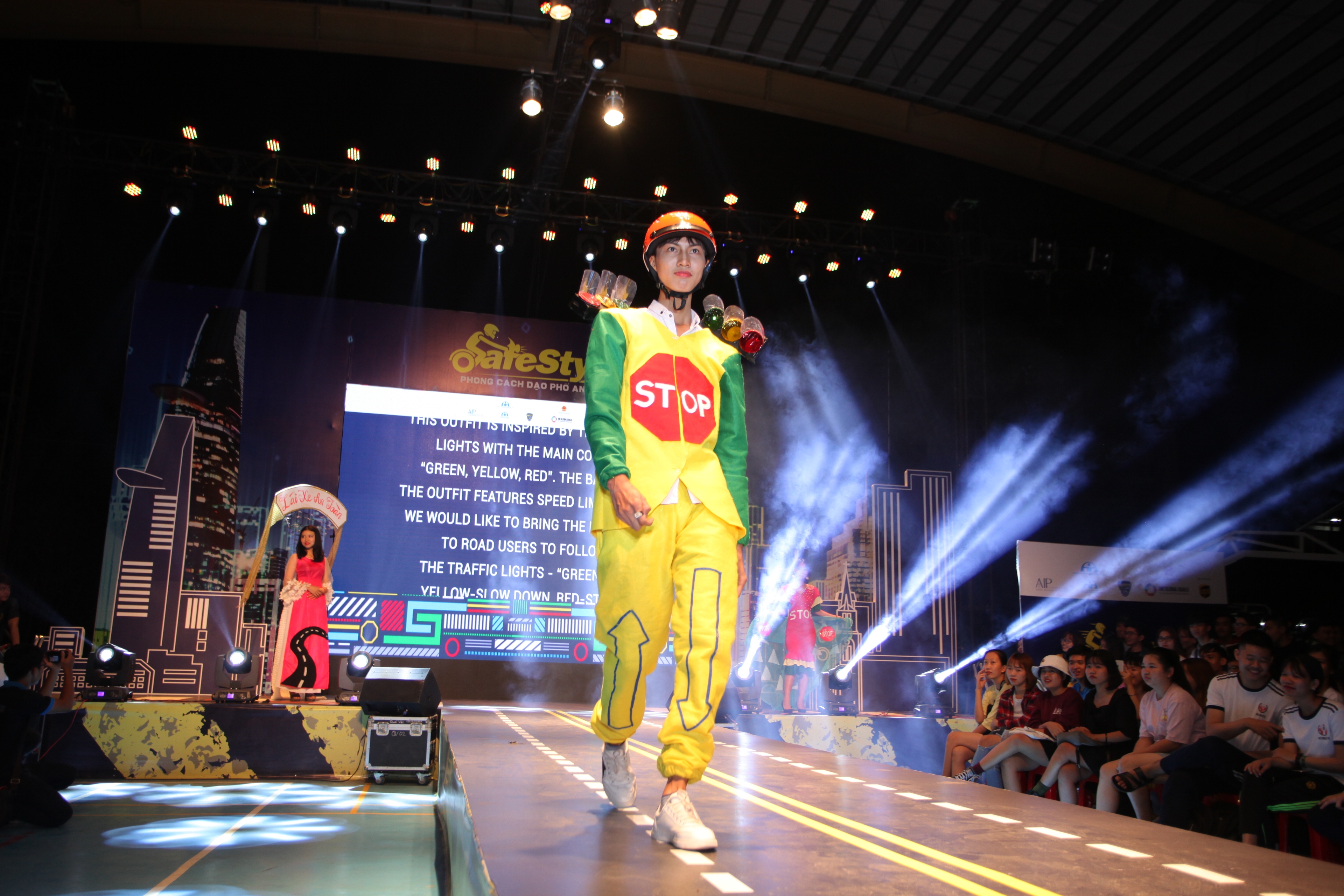 Local university students from Ho Chi Minh City walk the runway in their self-designed road safety themed outfits.