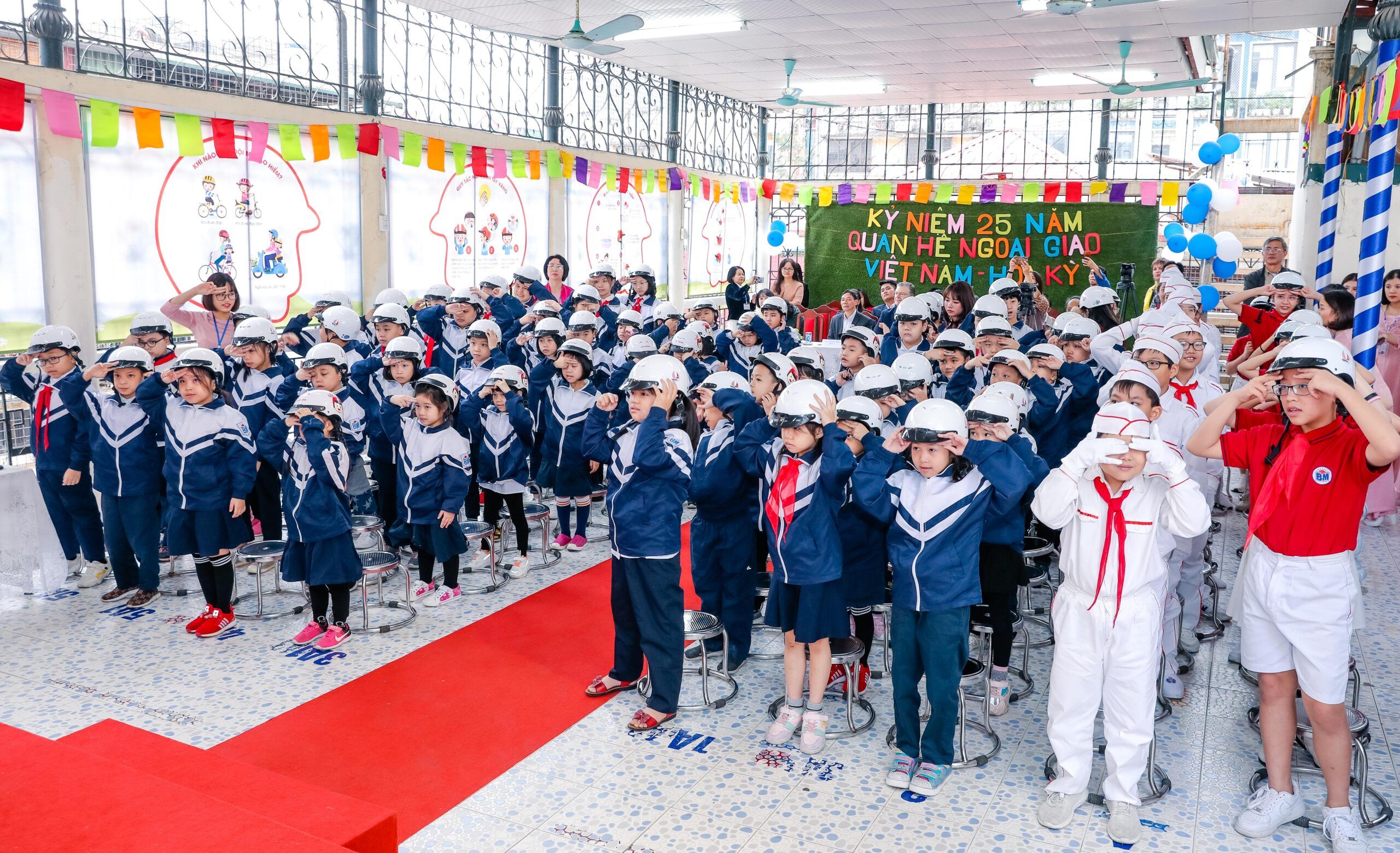 Special needs students and their teachers receive quality helmets and road safety training during International Day of Persons with Disabilities