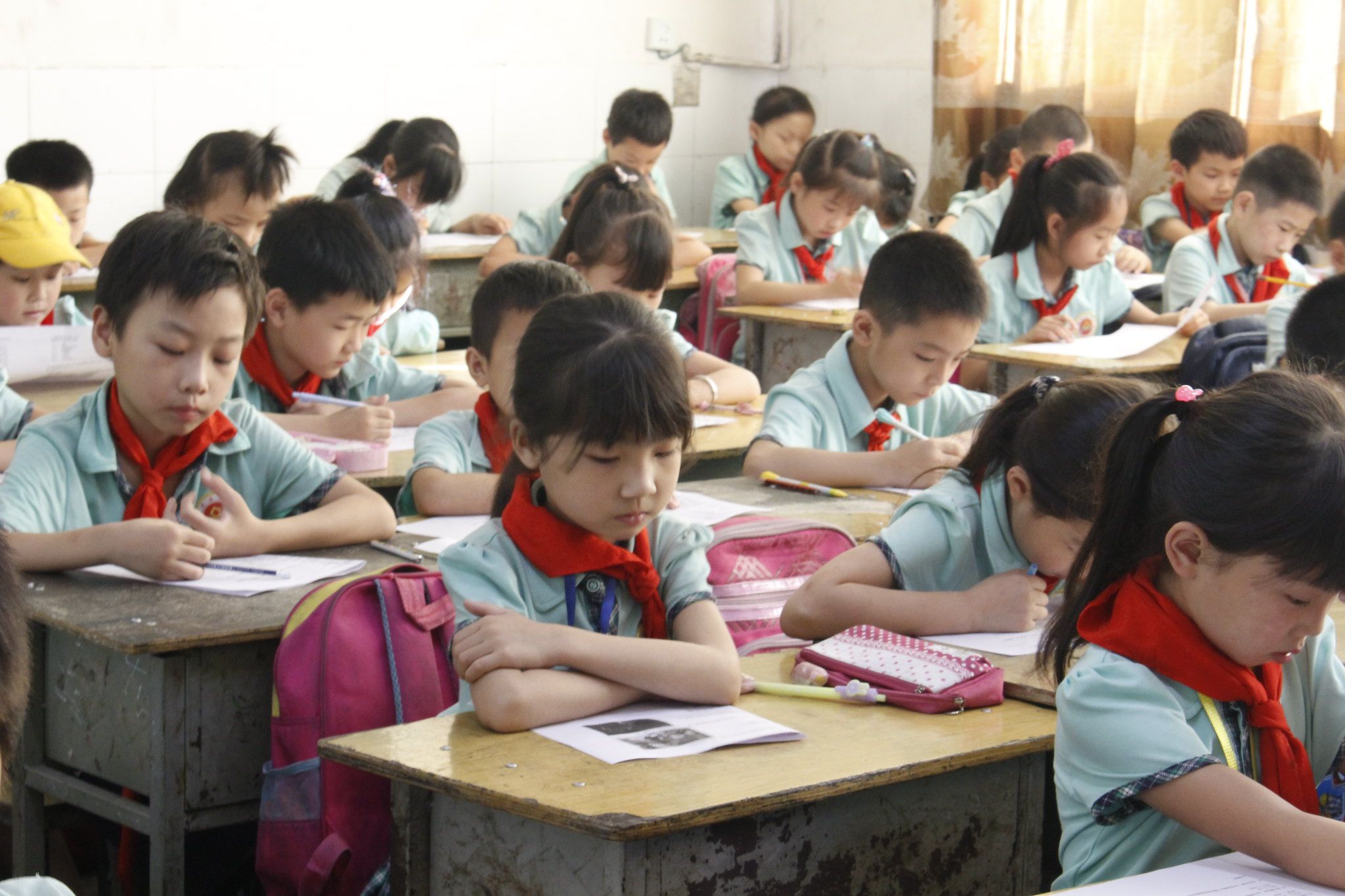 Students participate in knowledge test to evaluate road safety curriculum.