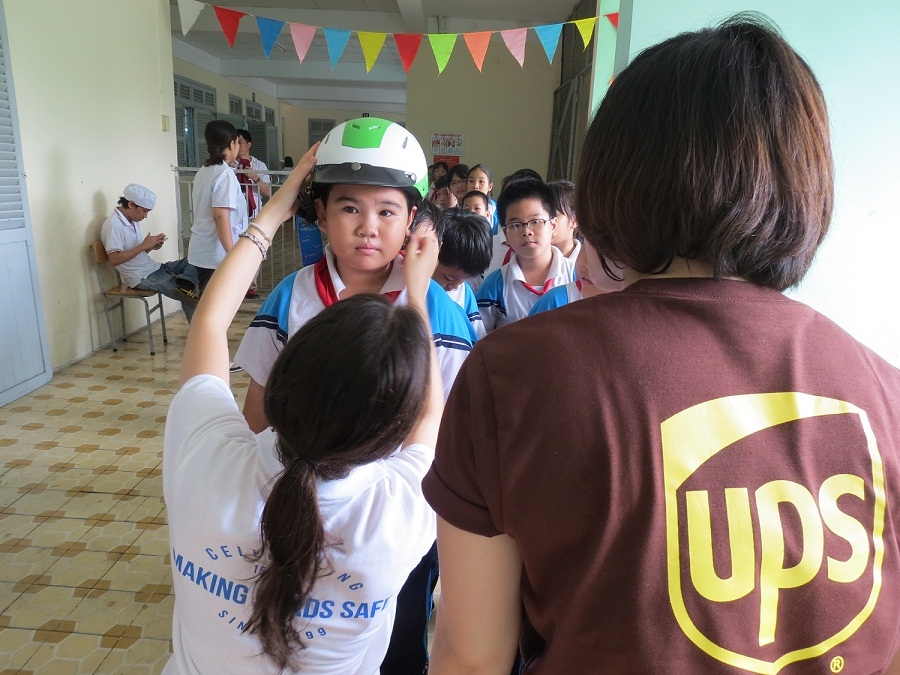 UPS conducts head measurements at Helmet for Kids program schools in preparation for helmet donation
