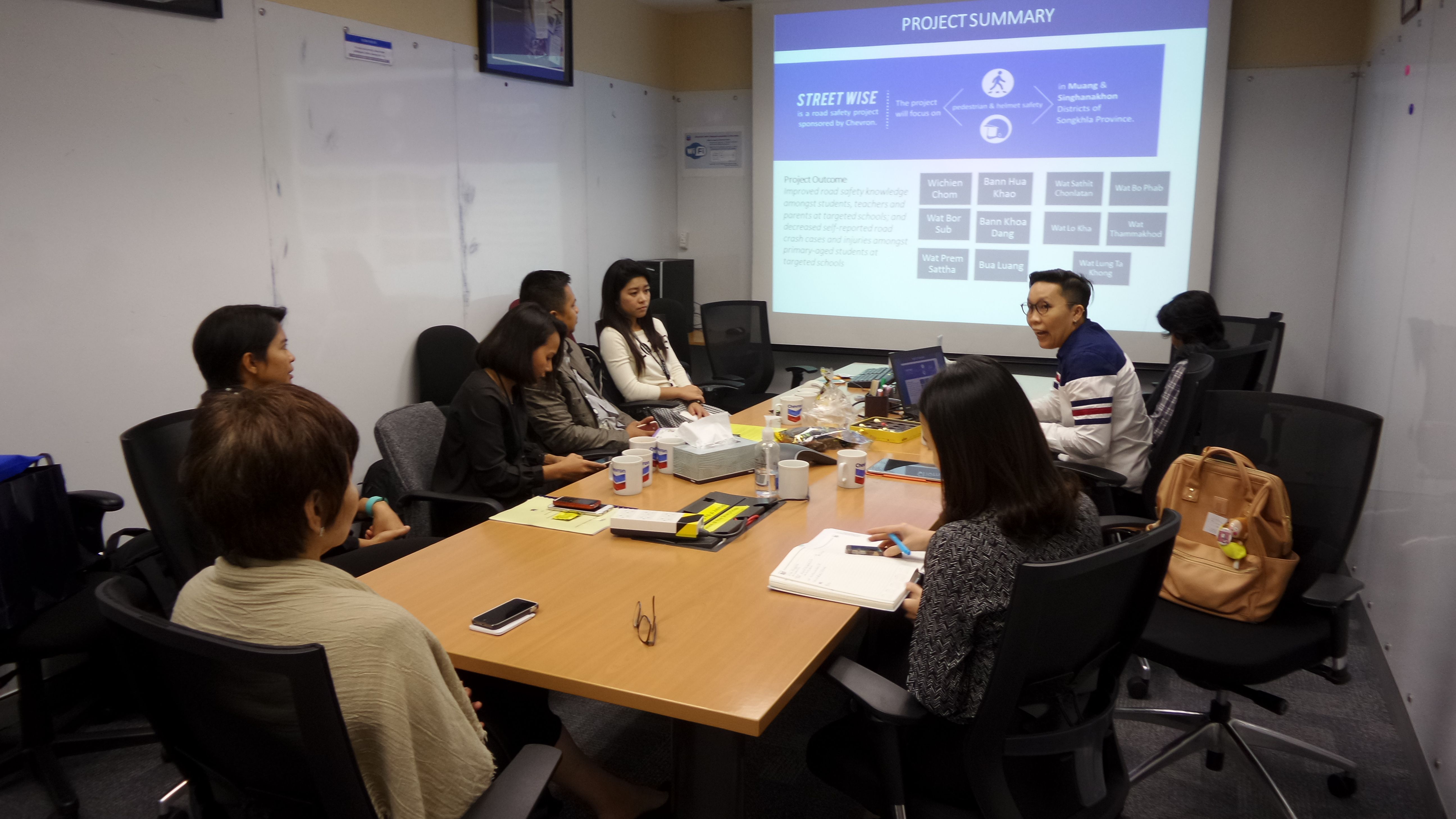AIP Foundation’s Thailand Country Manager, Oratai Junsuwanaruk, discusses the results from Phase 2 of the Street Wise program with representatives from Chevron Thailand Exploration & Production, Ltd.