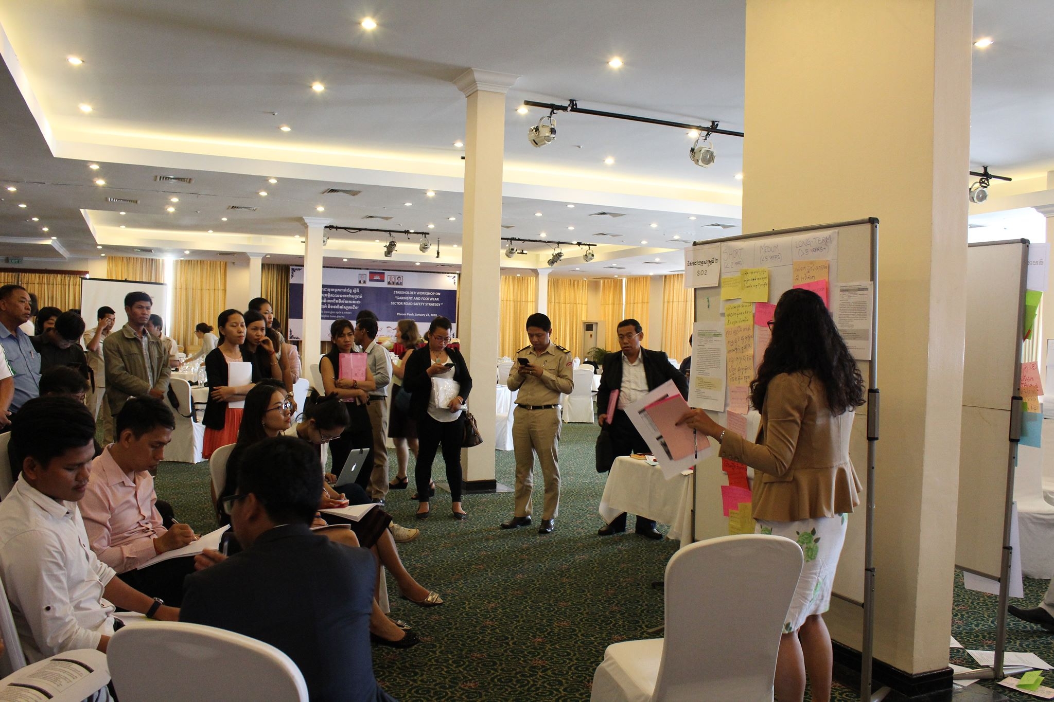 Stakeholders meet with each other during a breakout session of the strategy workshop.