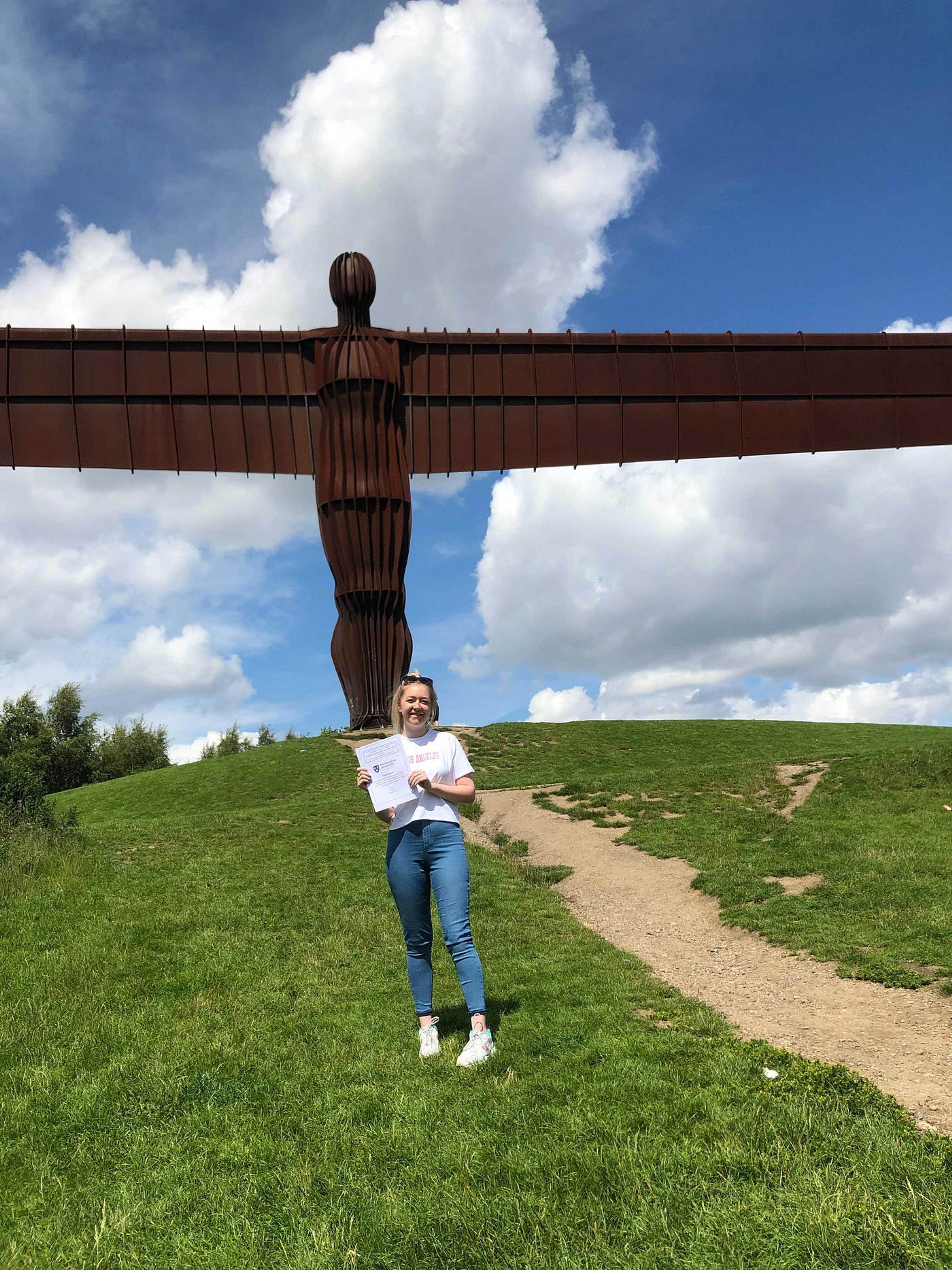 Picture of Lauren in front of the angel of the north