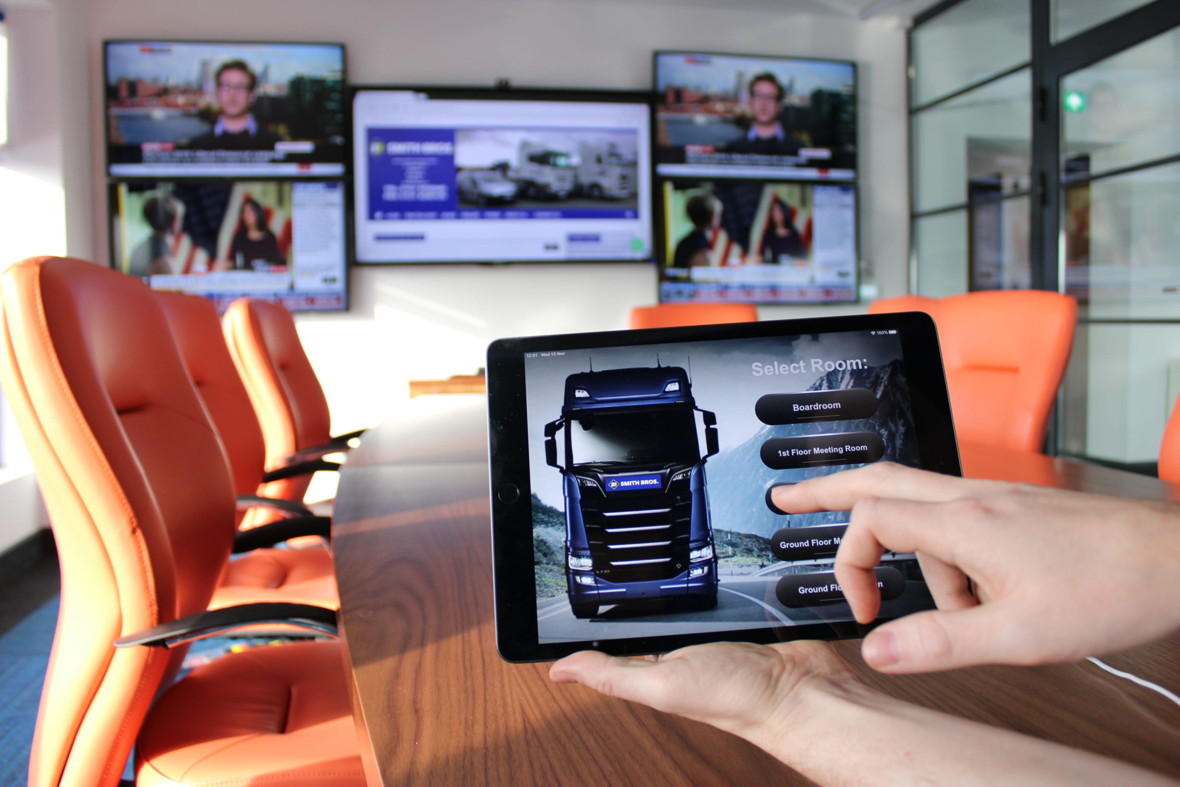 Room control interface in boardroom setting