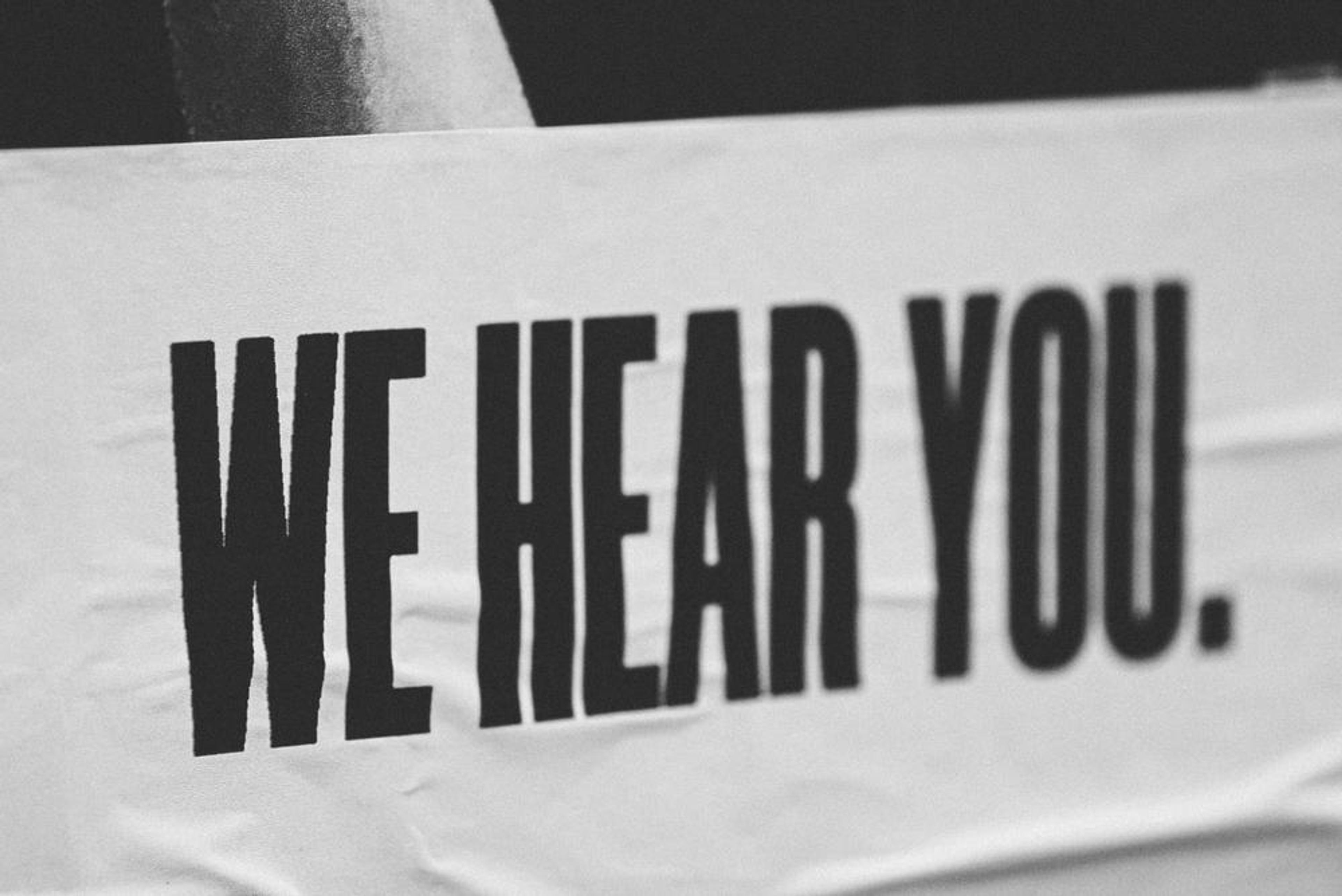 Photo by Jon Tyson on Unsplash "We hear you"