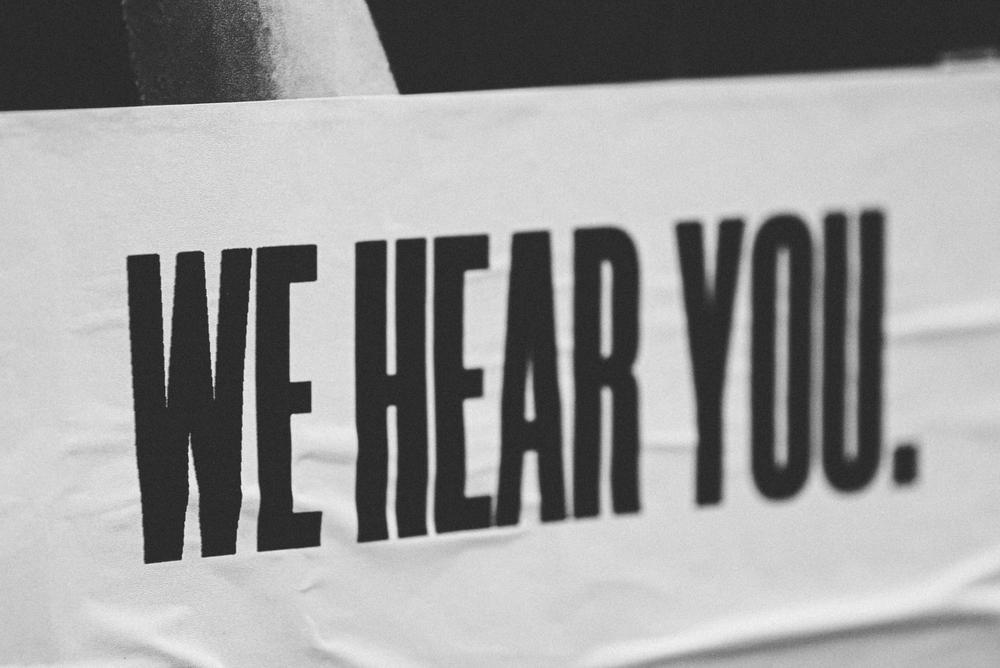 Photo by Jon Tyson on Unsplash "We hear you"