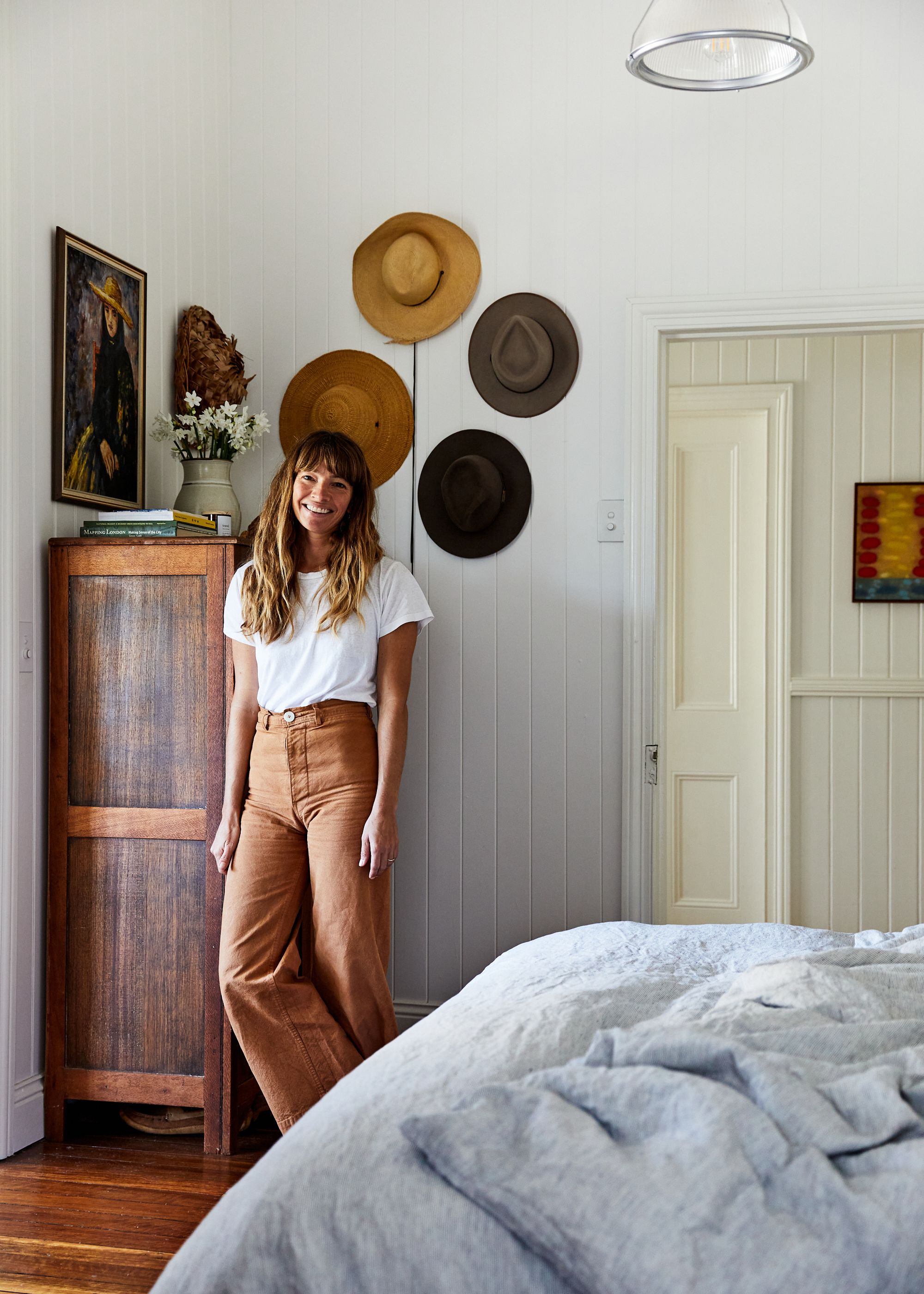 Courtney Adamo in her country-style bedroom