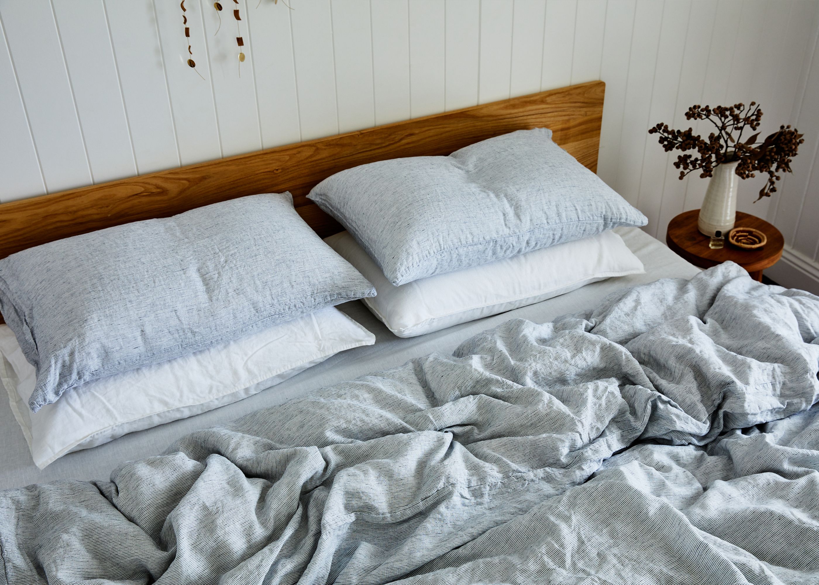 Pinstripe and white linen bedding