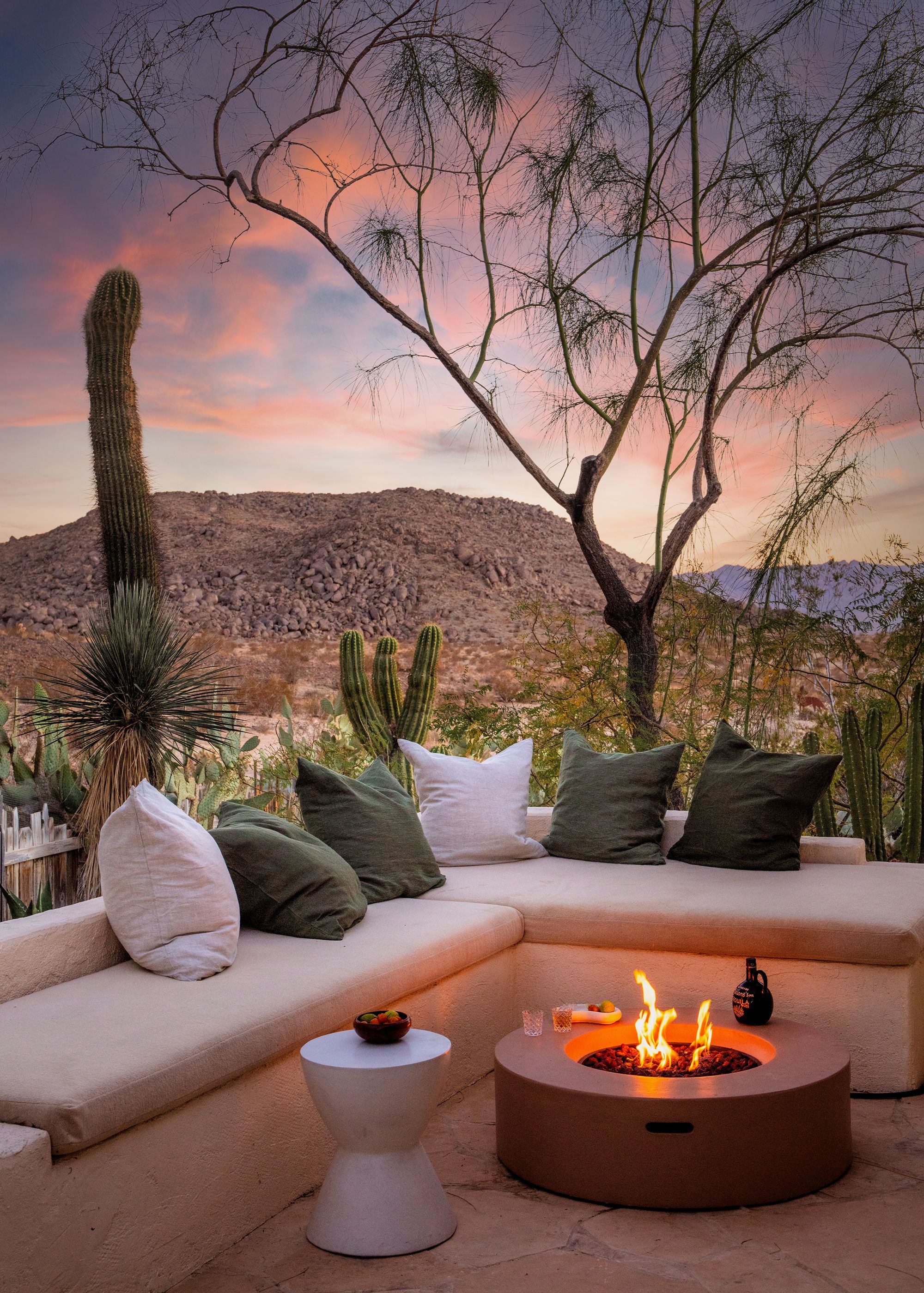 An outside sitting area around a fire pit in joshua tree