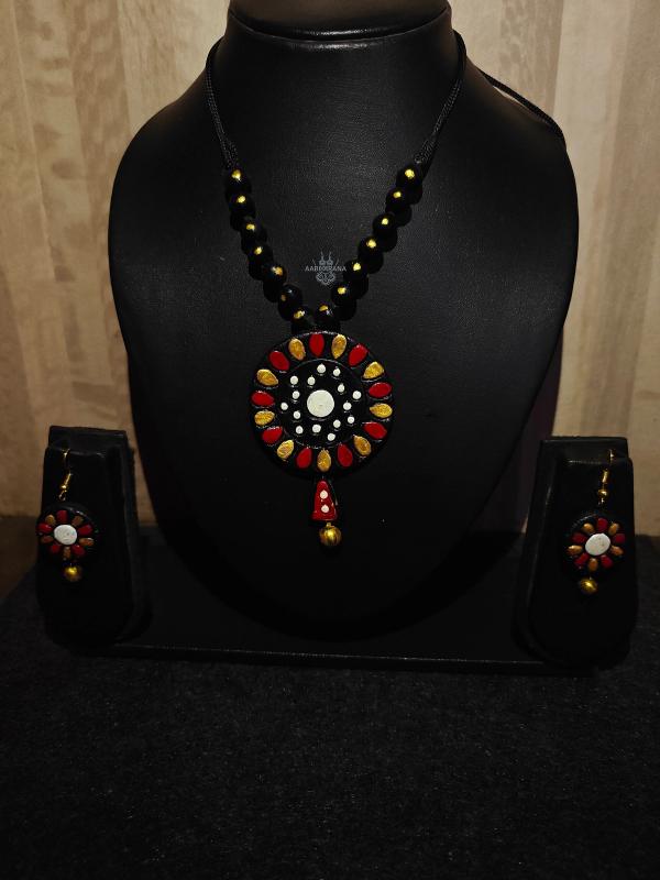 Traditional Clay Sunburst Pendant Jewelry with Beaded Black Chain