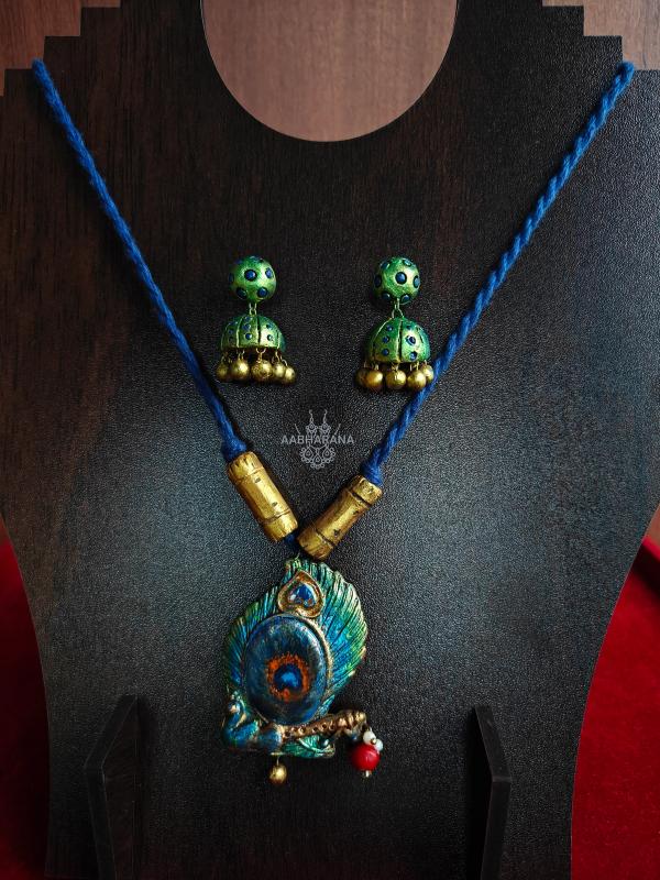 Handcrafted Peacock Feather & Krishna Flite Terracotta Jewelry Set with Jumkas
