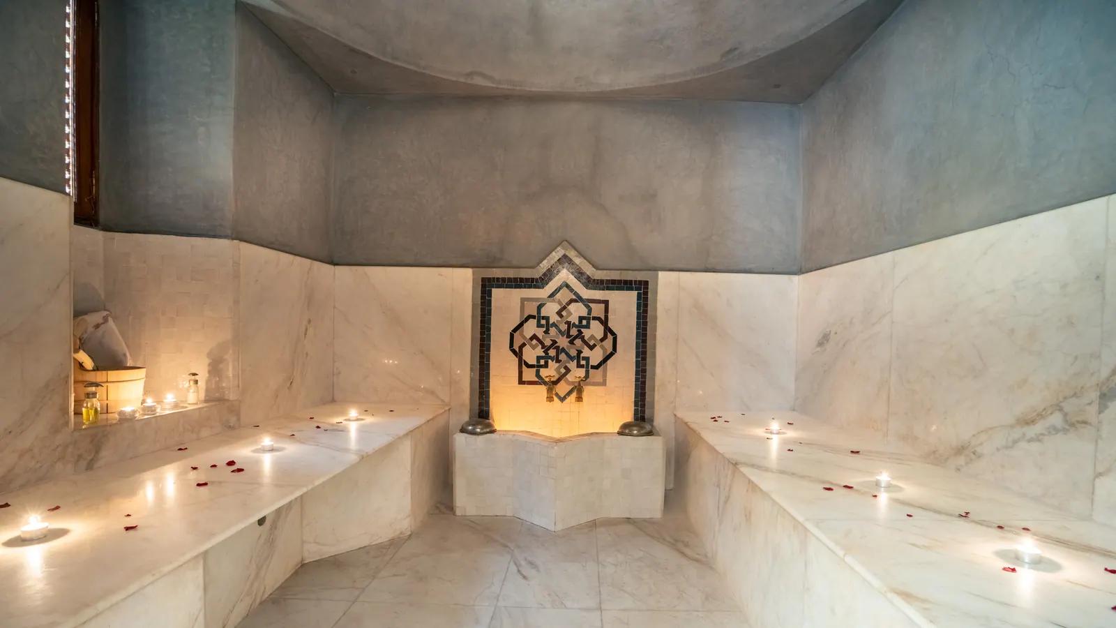 Traditional hammam with marble benches at Hammam ZIN