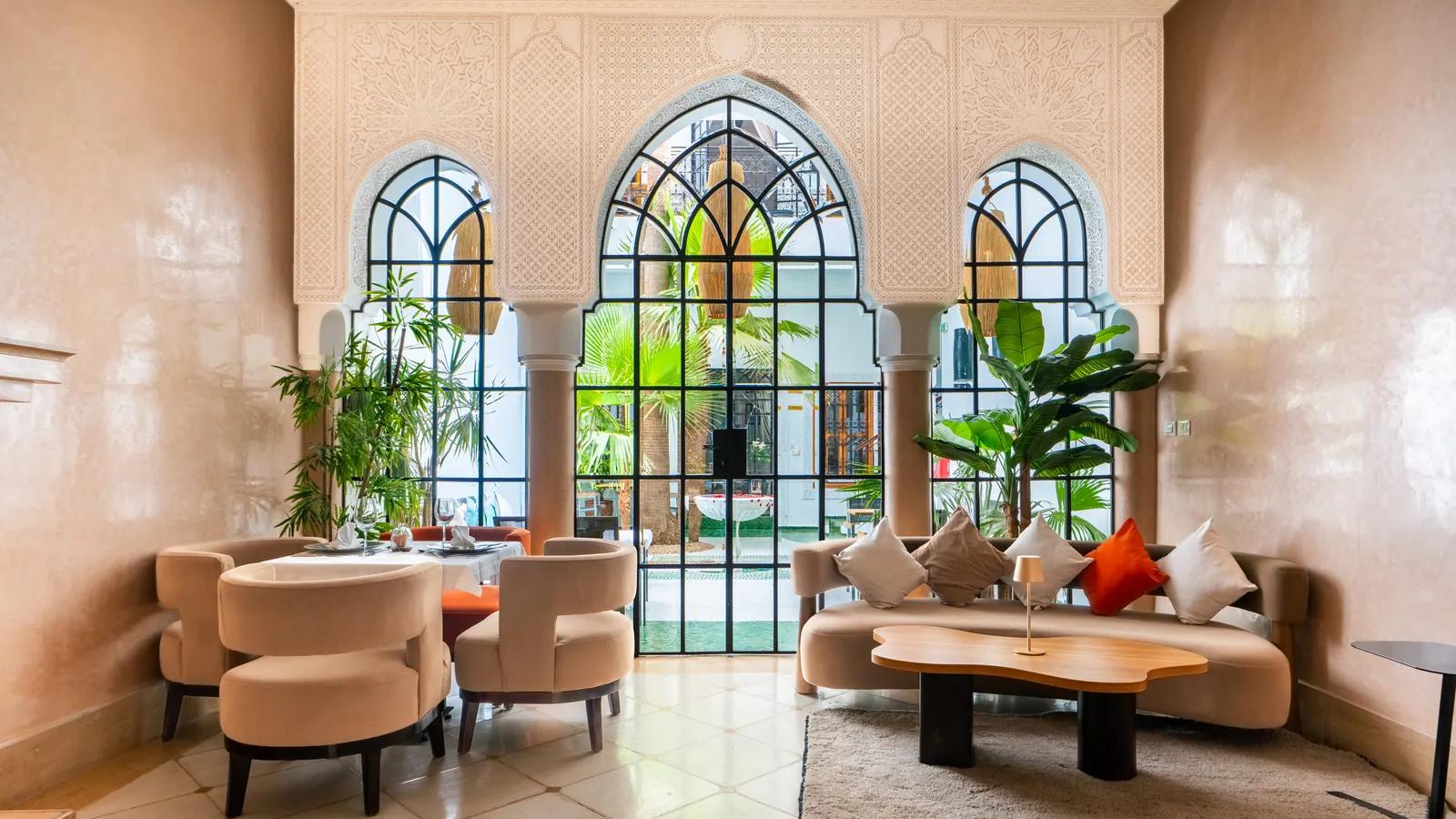 Lounge seating beside the arched courtyard windows