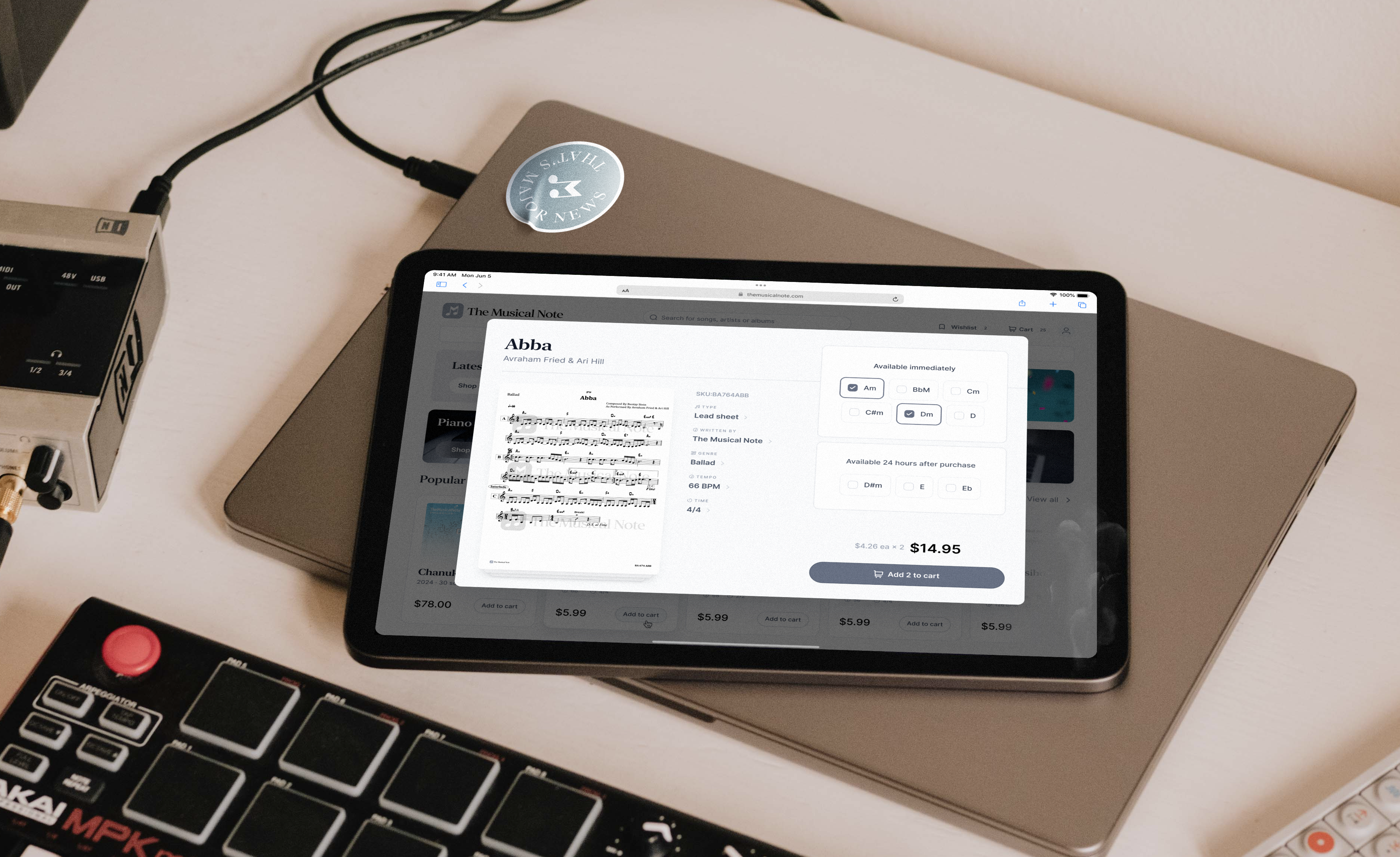The Musical Note: Sheet music preview and purchase dialog on a tablet.