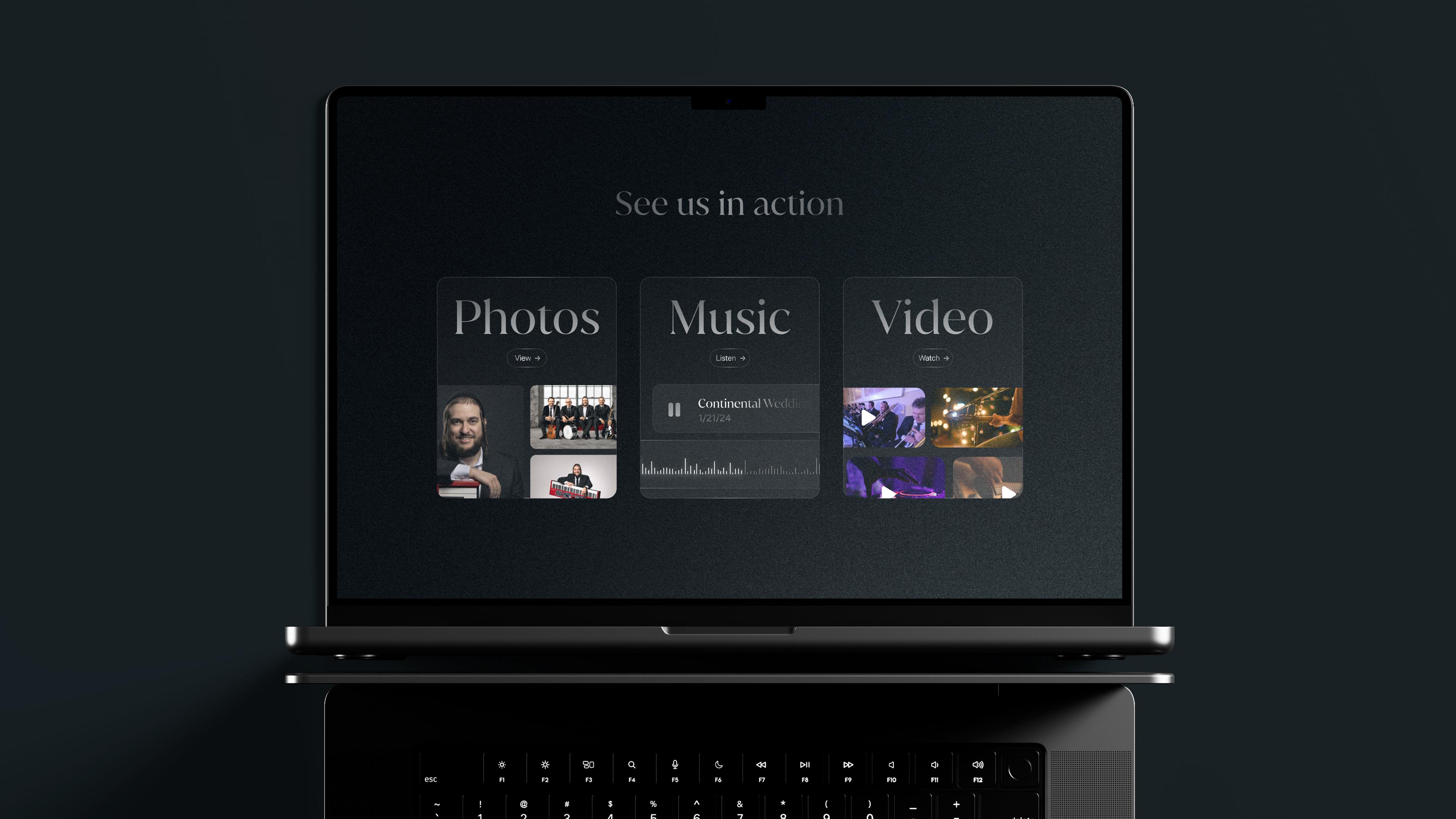Mendy Hershkowitz Band: Photo, music, and video gallery navigation on a laptop.