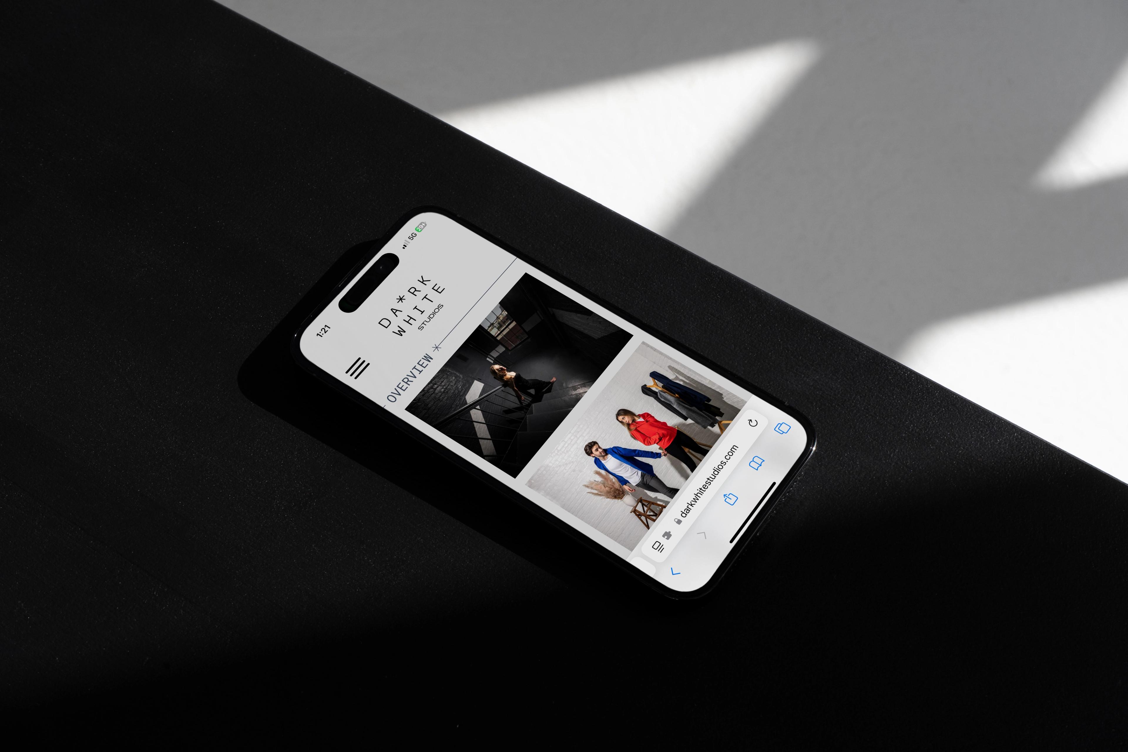 Dark White Studios: Mobile photography portfolio on a phone.