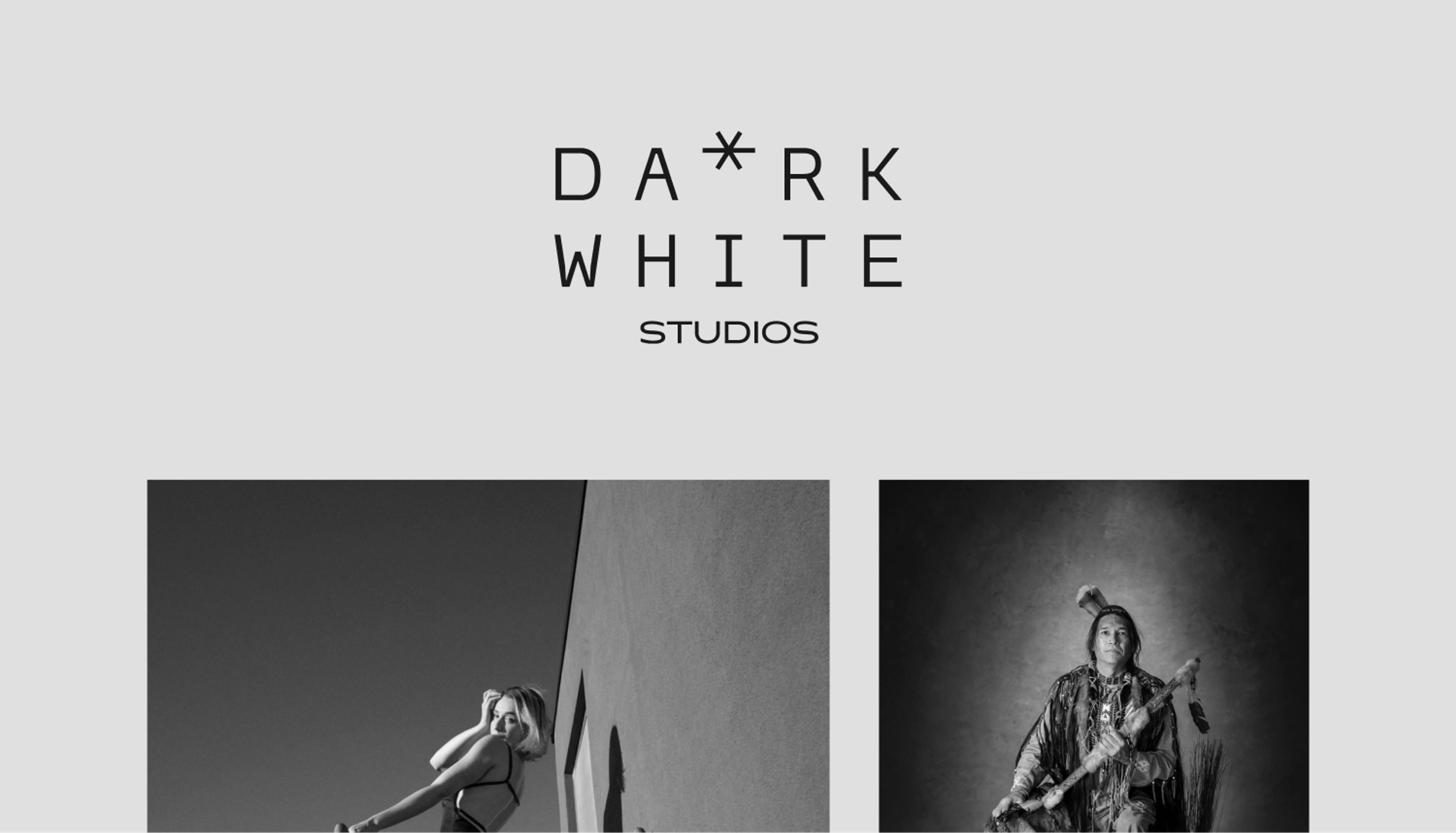 Dark White Studios: Black wordmark above monochrome photography. Design by D7mtg.
