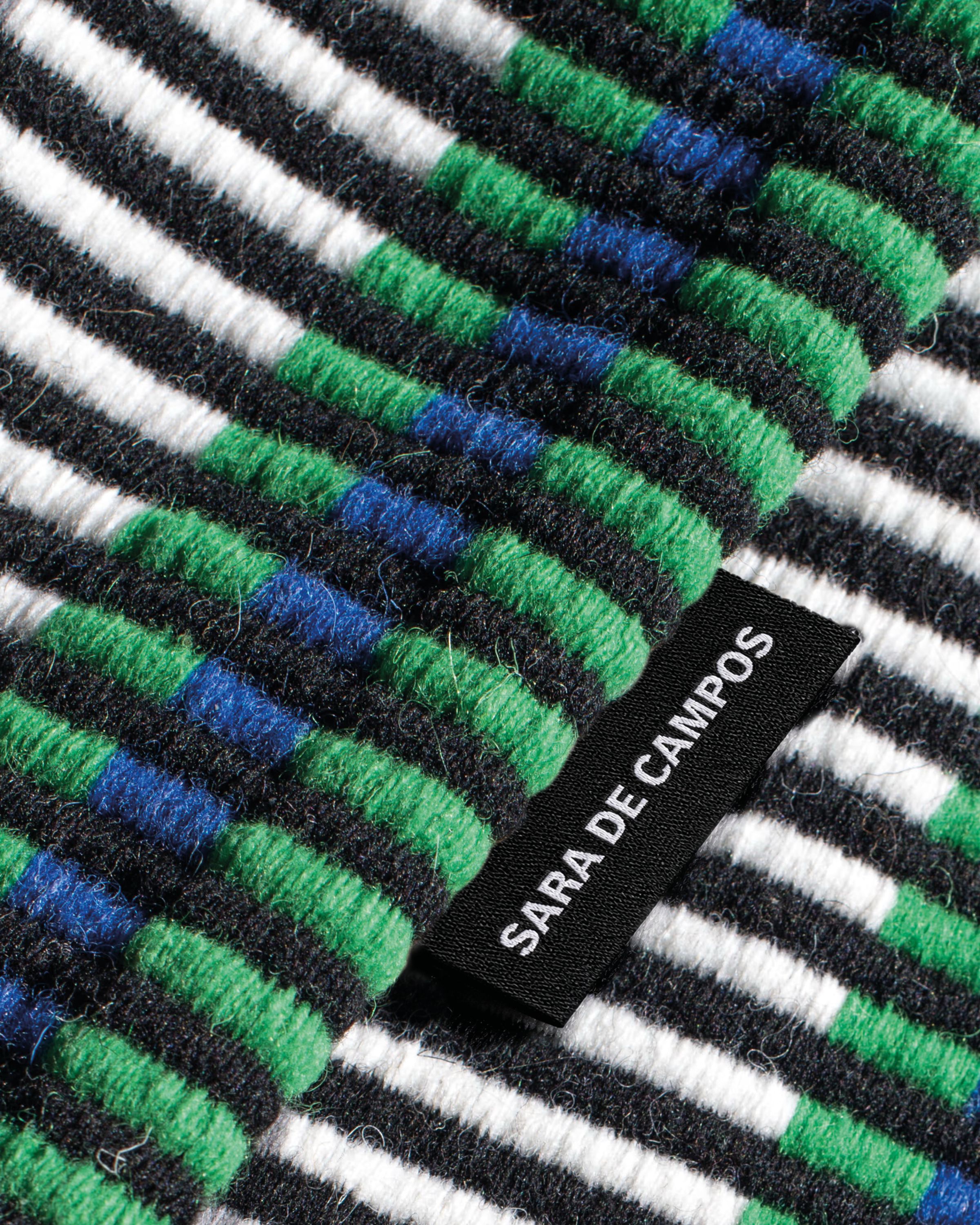 Sara de Campos Identity