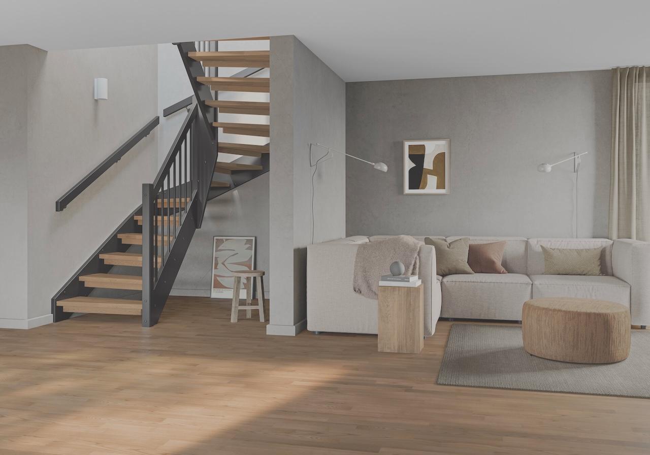 En trapp i samme tresort som gulvet kan skape et harmonisk interiør, mens kontraster kan gi mer liv til rommet.