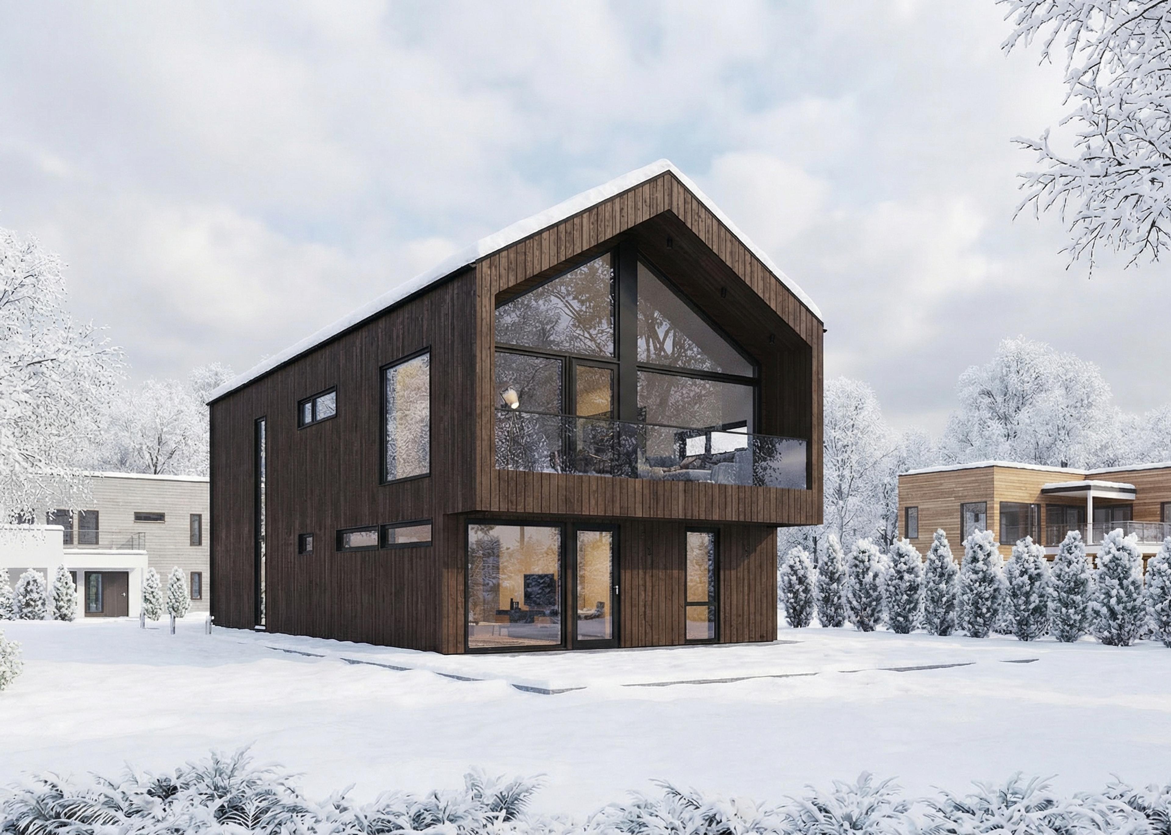 Tønsberg i vinterlandskap - et moderne hus med store vinduer i front
