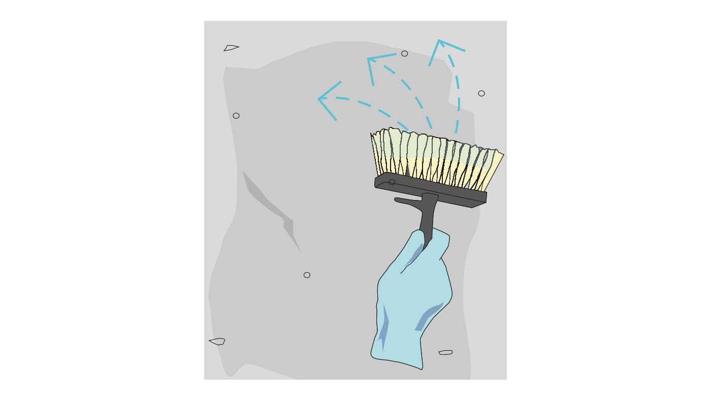 A gloved hand brushes a grey wall with a wide brush, with blue arrows indicating the sweeping motion.
