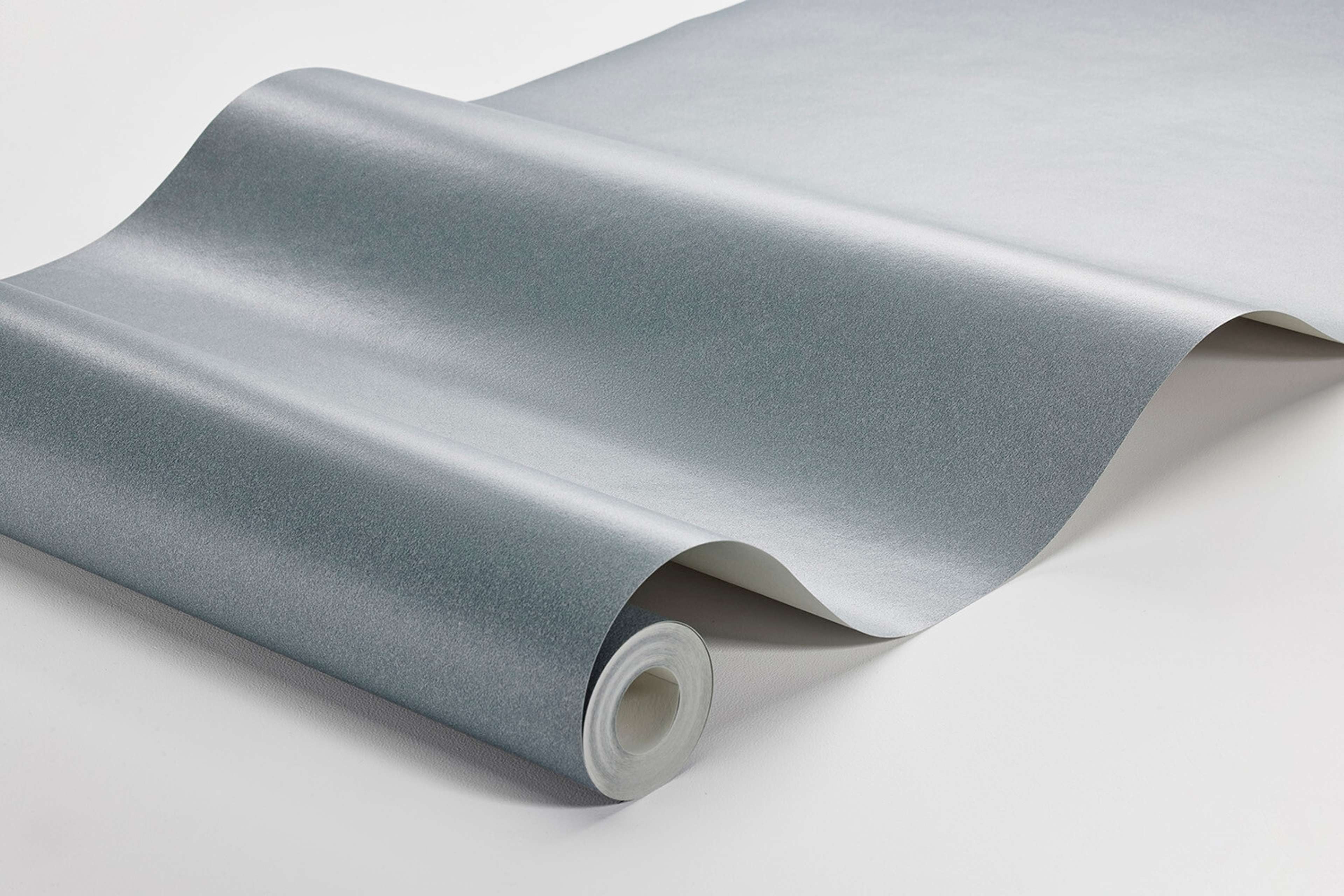 Ocean Sand tapet enfärgad i grå. Från kollektionen Pigment. Nonwoven-material.