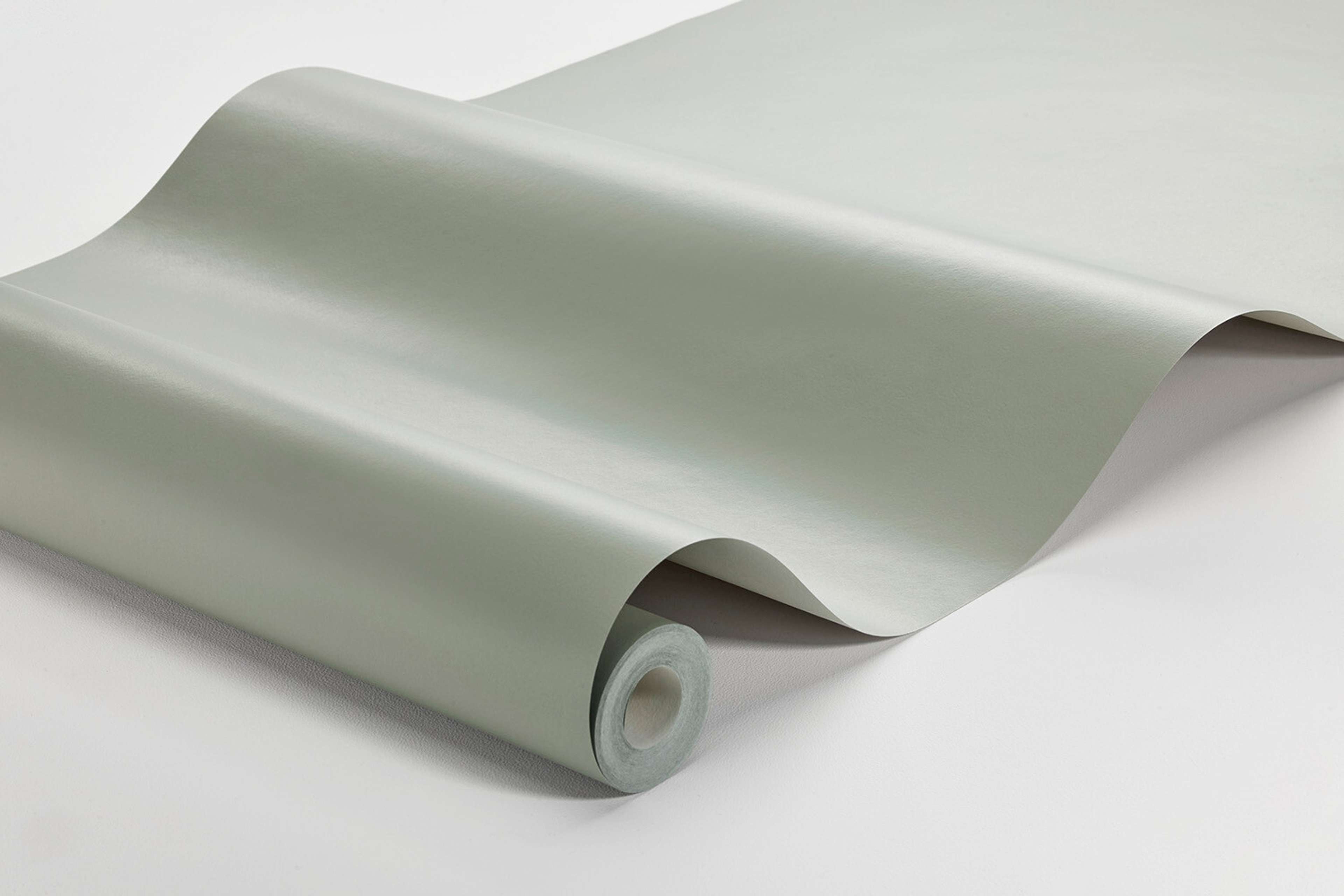 Light Olive tapet enfärgad i beige. Från kollektionen Pigment. Nonwoven-material.