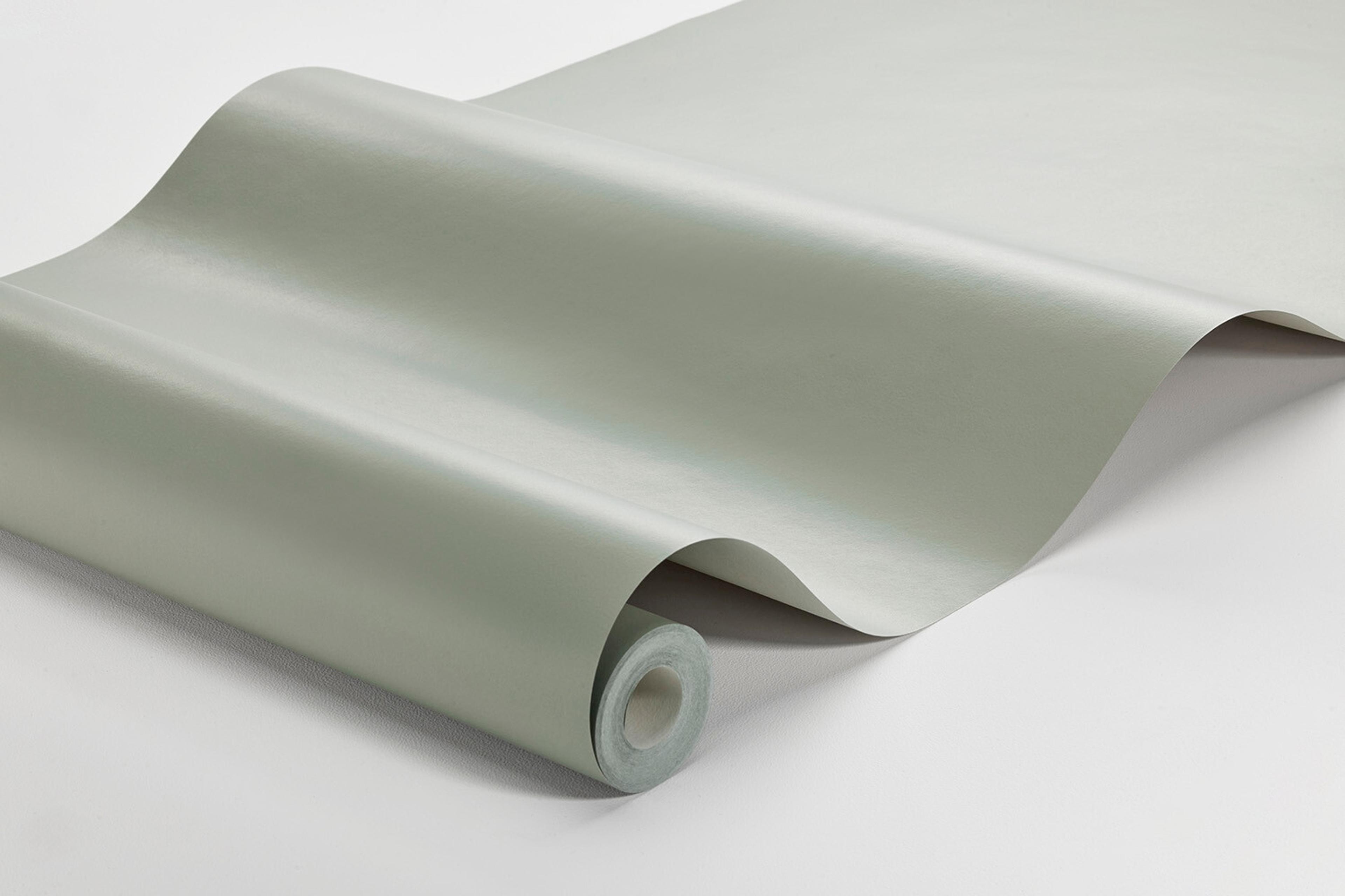 Light Olive tapet enfärgad i beige. Från kollektionen Pigment. Nonwoven-material.