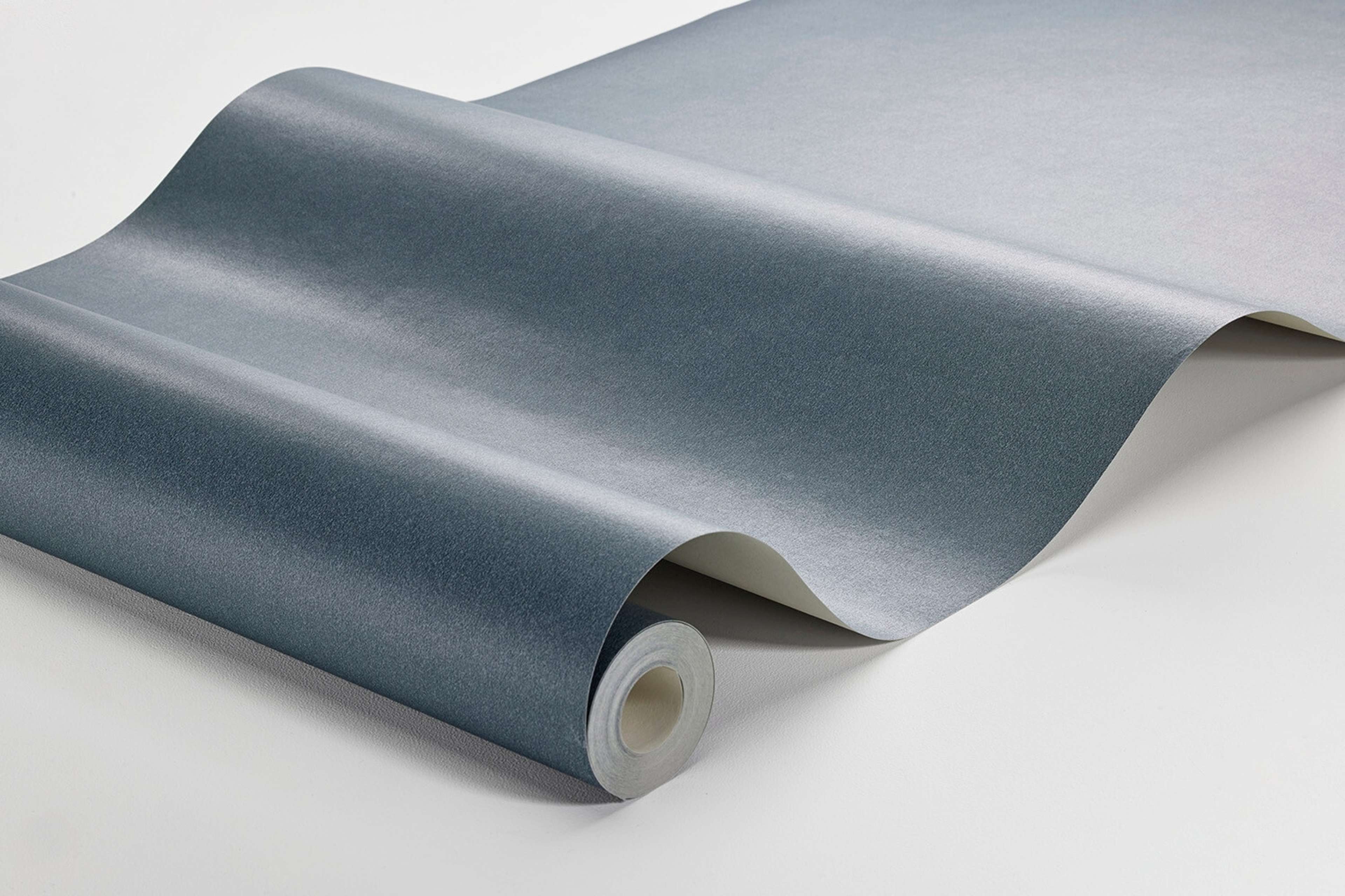 Marin Sand tapet enfärgad i grå. Från kollektionen Pigment. Nonwoven-material.