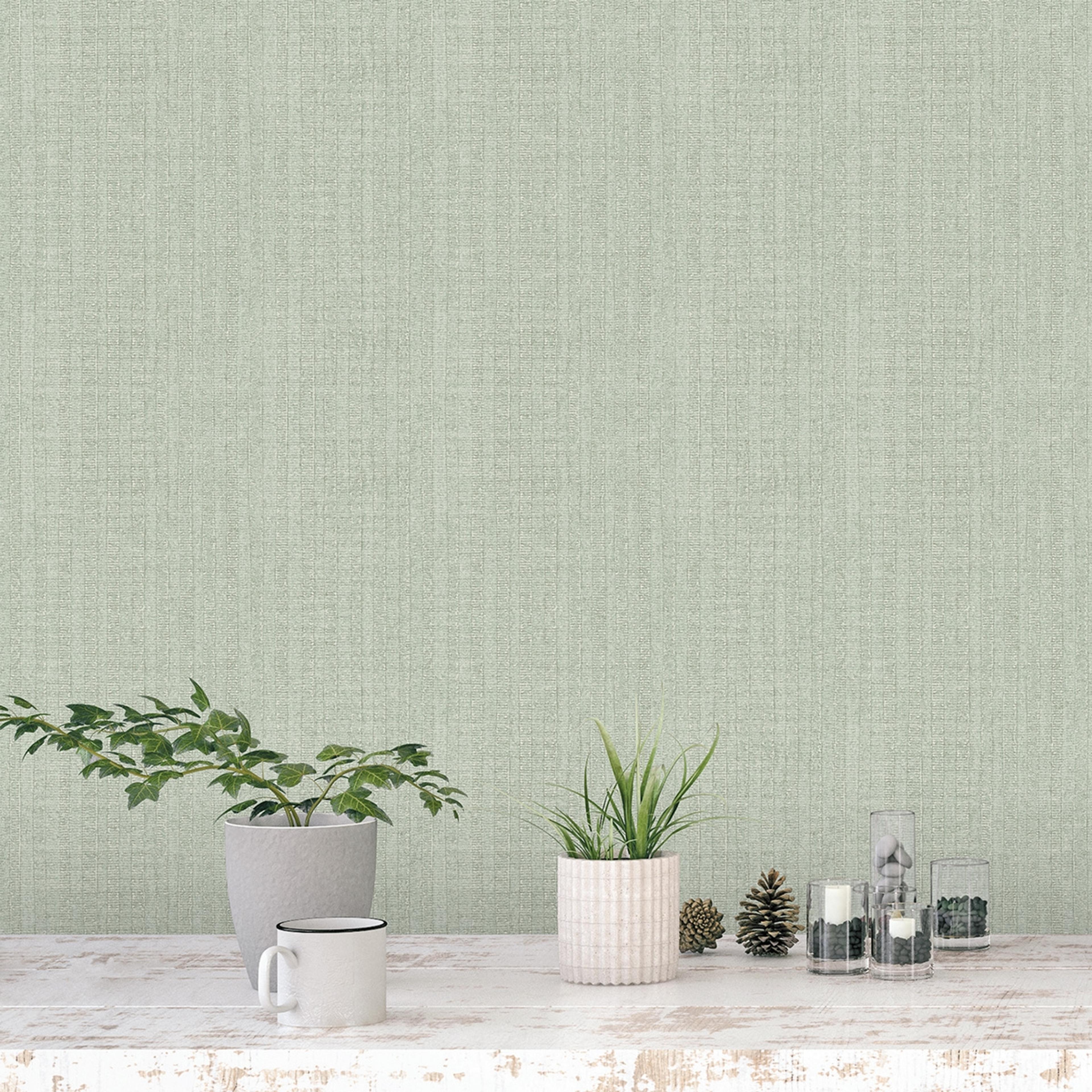 Moss Stripe tapet i grön tapet med randigt mönster i grön. Från kollektionen bazaar. Nonwoven-material med rak passning. Passar i vardagsrum och matsal.