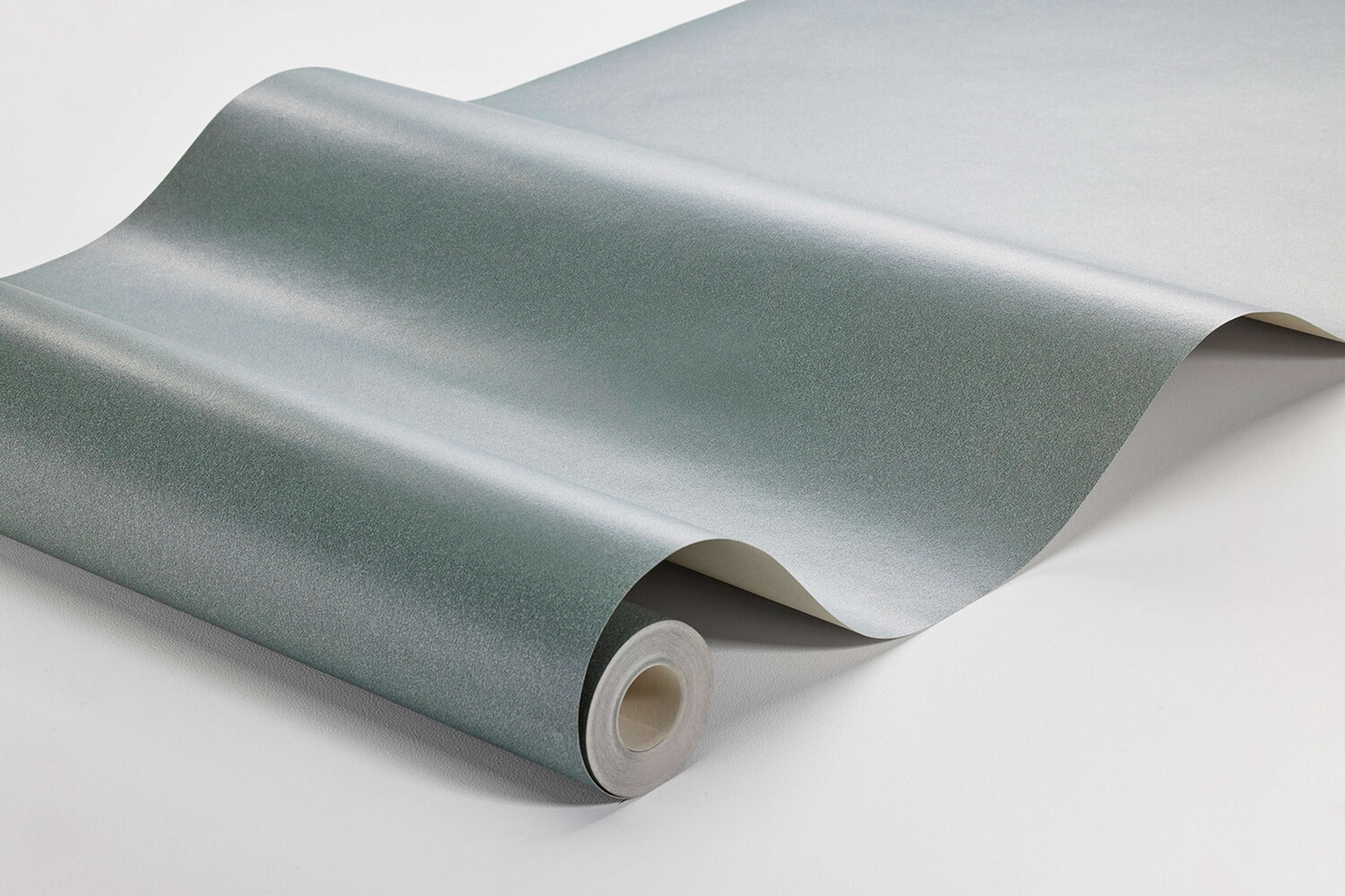 Lagoon Sand tapet enfärgad i grå. Från kollektionen Pigment. Nonwoven-material.