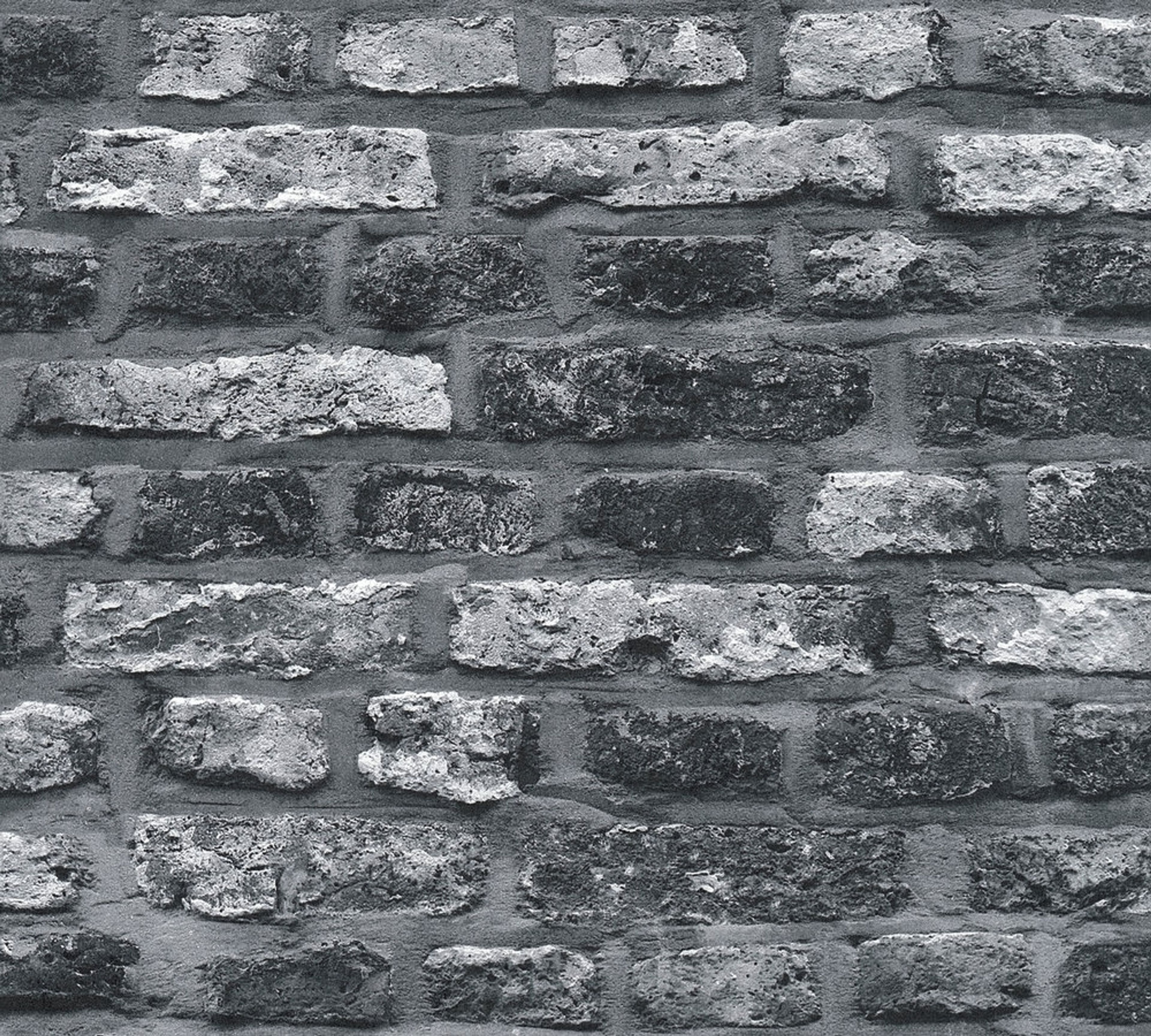 Dark brickwall, strukturtapet i grå tapet med tegelsten mönster i grå. Från kollektionen best of wood n stone 2. Nonwoven-material med förskjuten passning. Passar i vardagsrum och matsal.